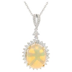 Colgante de ópalo y diamantes de oro blanco macizo en collar de eslabones por cable de 16