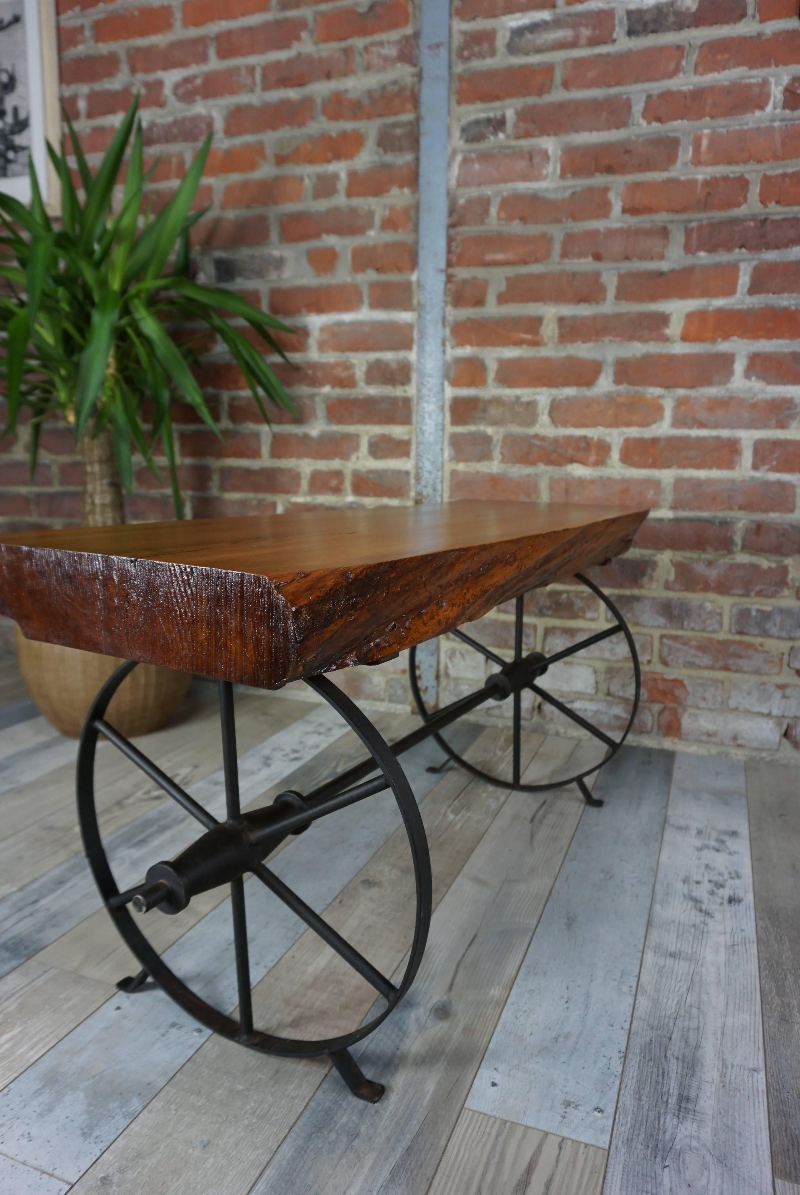 Of course the wheels are fixed, but it gives it a charm. Solid wood tray and iron structure. Industrial style and vintage design!