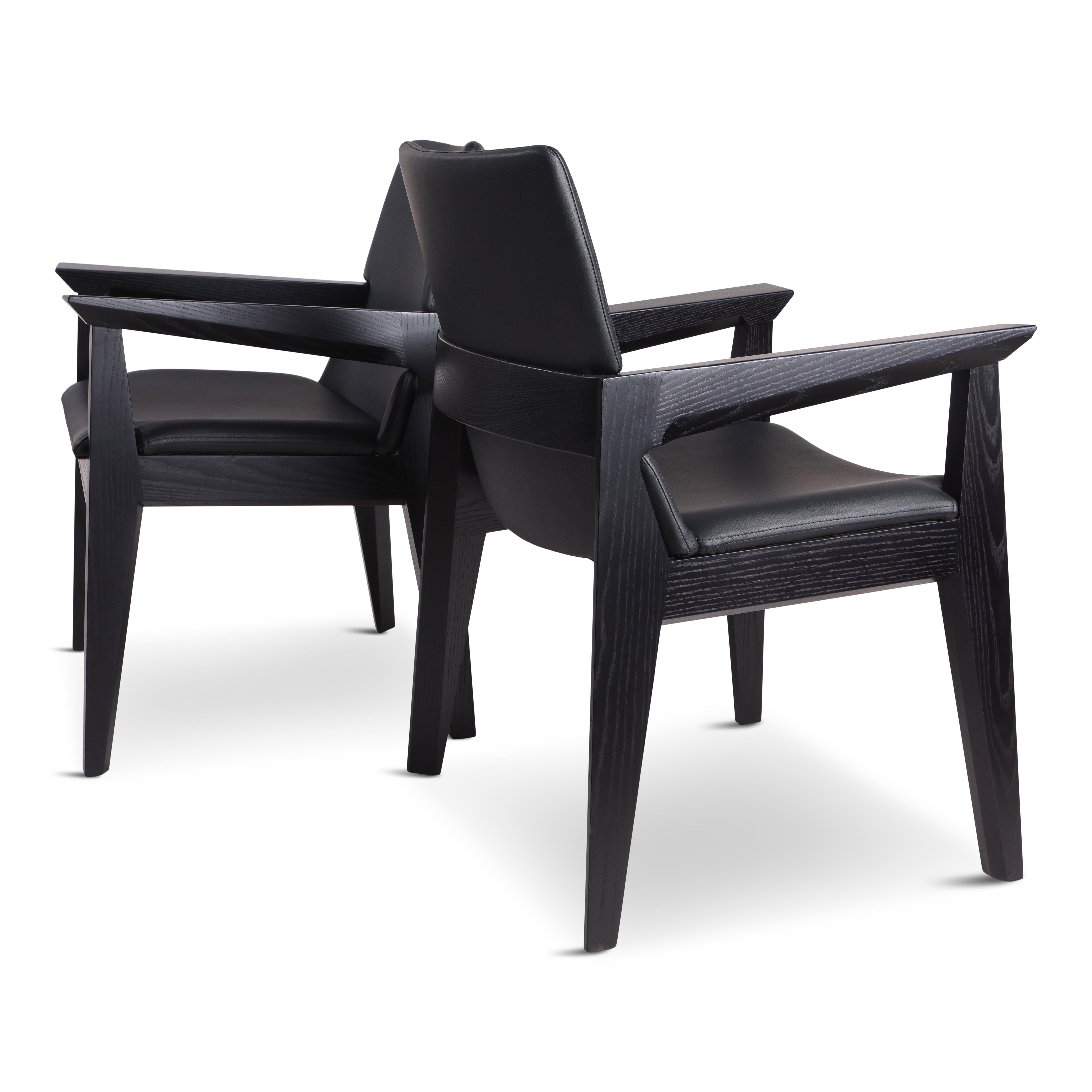 The Kroft arm-chair features a contoured leather seat and backrest set inside a solid-wood frame. Shown in solid Black Ash with flat-grain Italian leather upholstery. 

The Kroft chair is built-to-order. Bespoke options always available. Wood