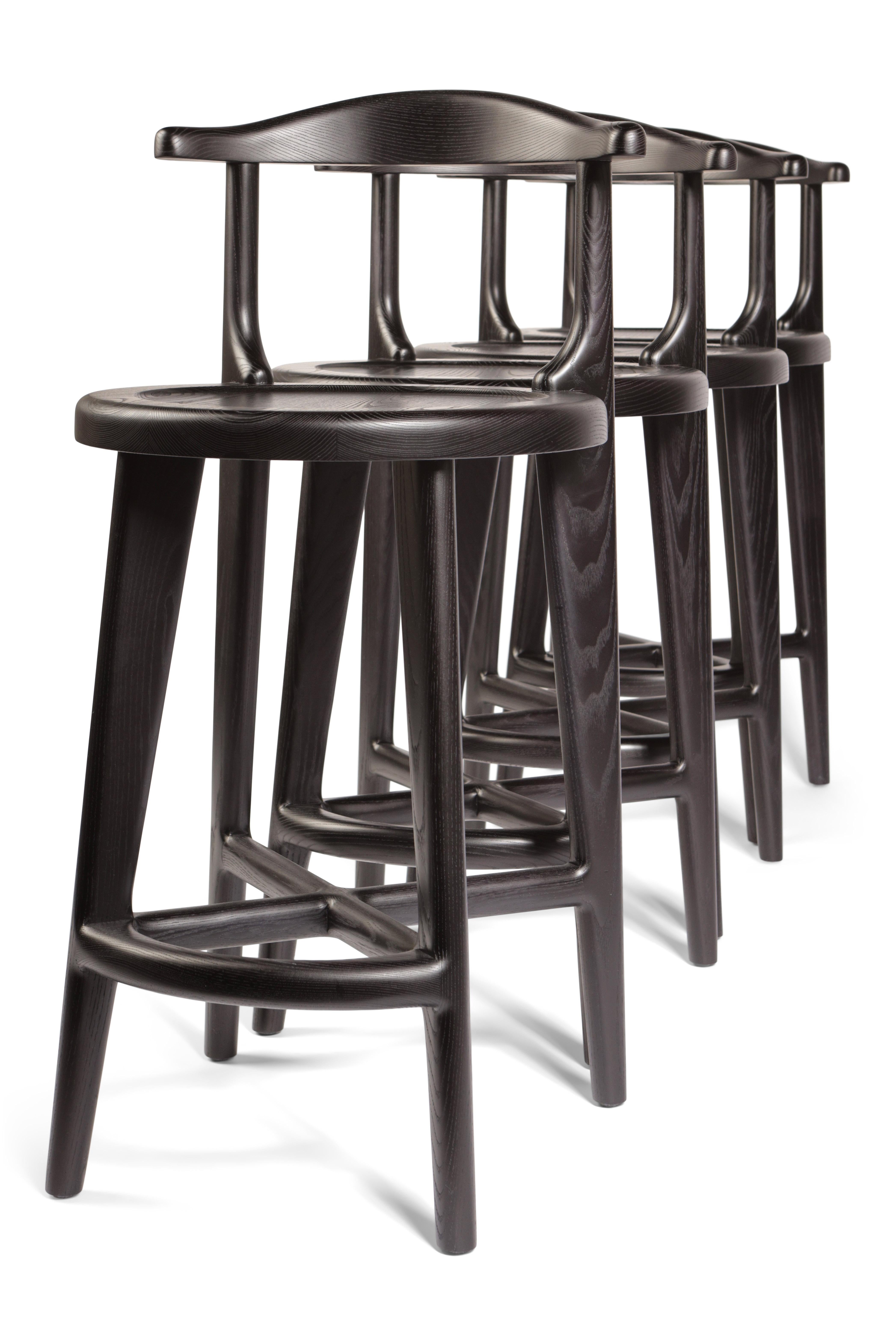 A classic design that will beautifully suit any home interior. Crafted from solid American Ash with a grain-popping jet-Black stain. Our stools feature generously sized seats and ergonomically sculpted back / arm rests.
A beautifully sculpted