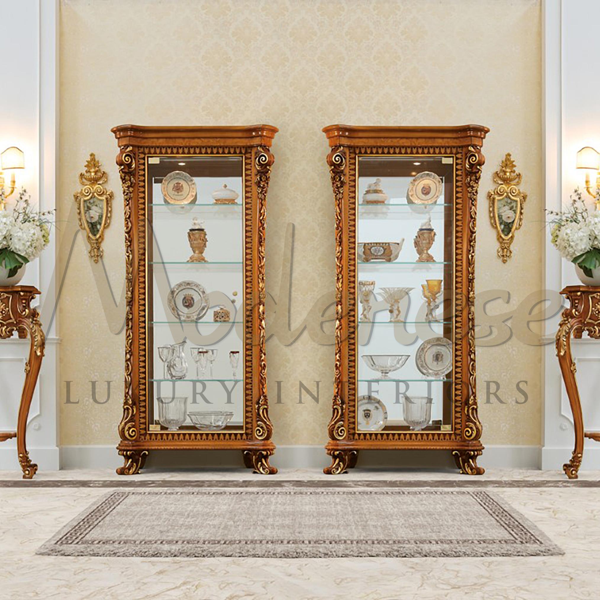 Modenese Luxury Interiors is proud to promote his production and design services by showing you this wondeful baroque vitrine for dining rooms. Its wide glass surfaces are ideal for big house areas and dining atmoshperes, where the light for