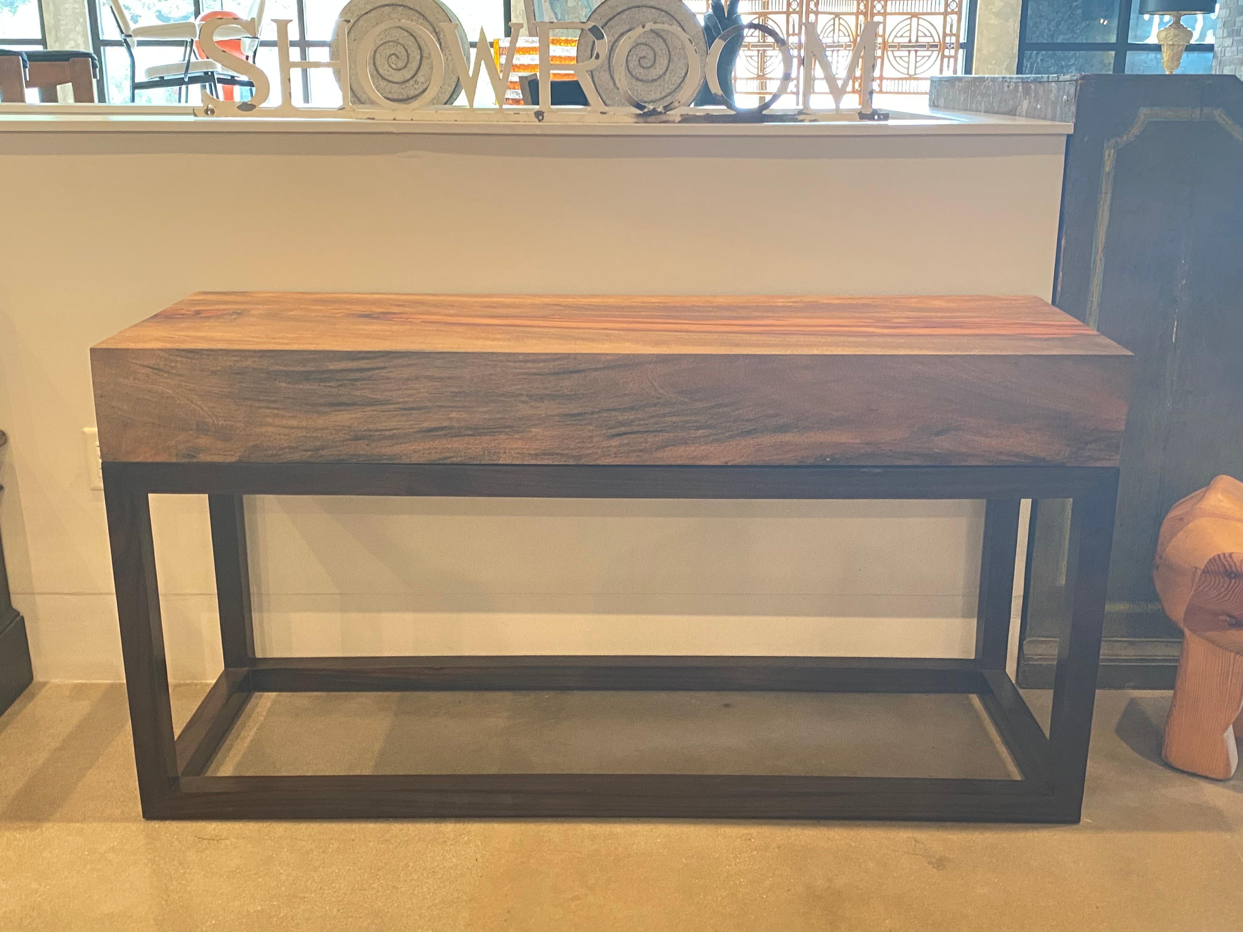 Solid wood block console table cut from the formerly live-edge trunk of an elm tree. Dark stained wood Parsons style base. 