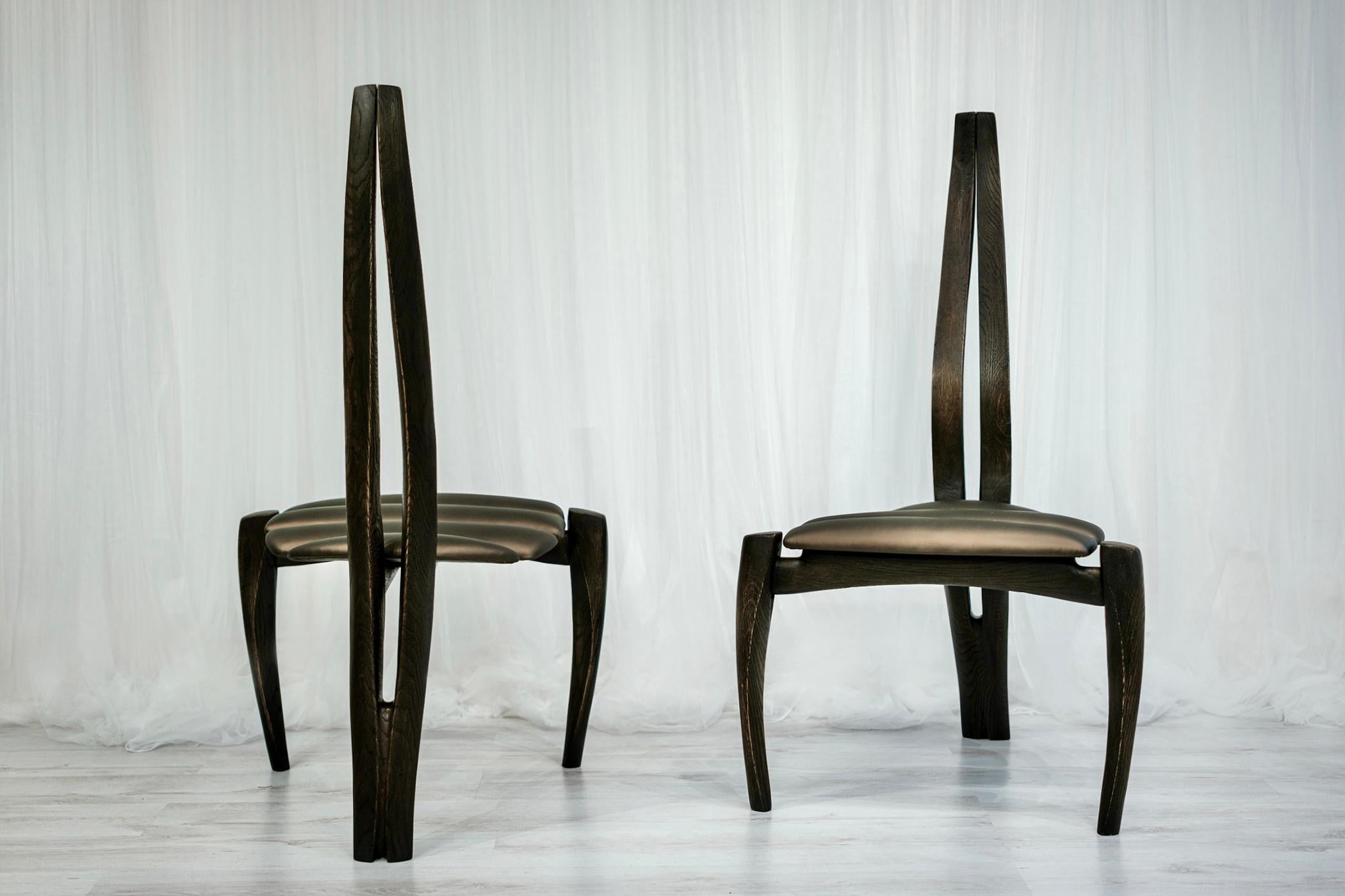 Hand-Carved Solid wood carved and leather Vennaxa Chair For Sale