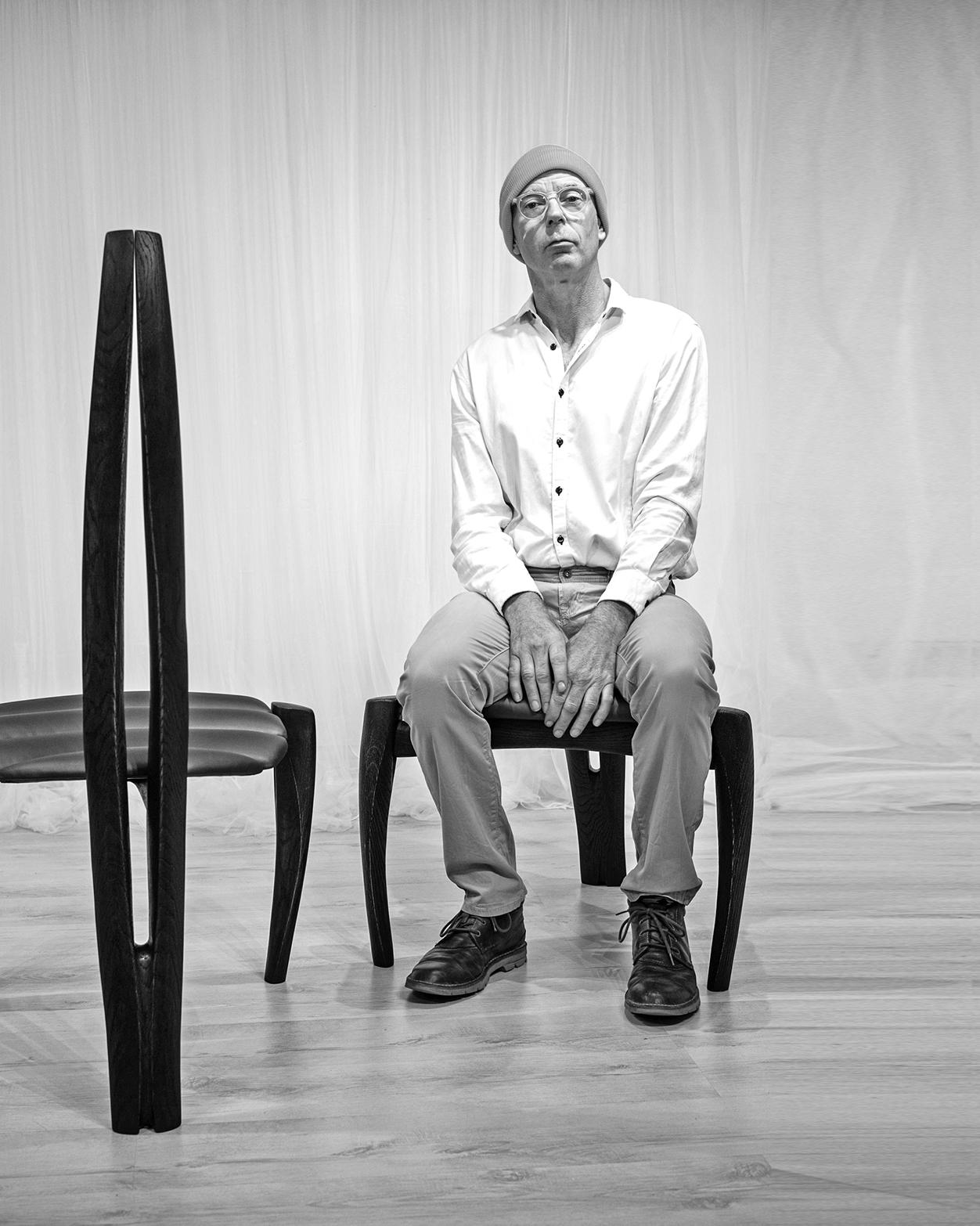 Contemporary Solid wood carved and leather Vennaxa Chair For Sale