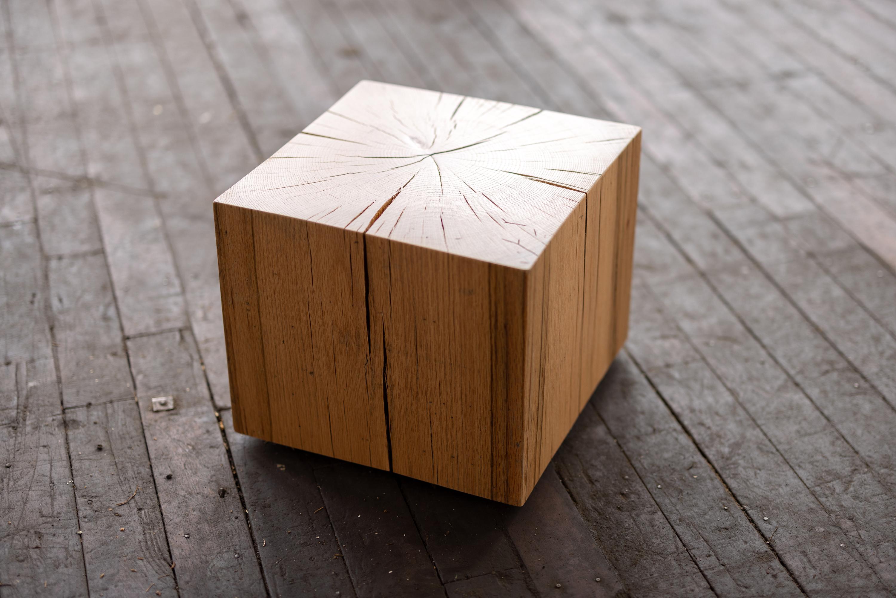 Solidly built using urban wood, the Le Boit Collection combines rustic appeal with a clean, contemporary design. The unique beauty of urban wood as a solid volume makes a statement as a display for your art piece or personal treasure, offering