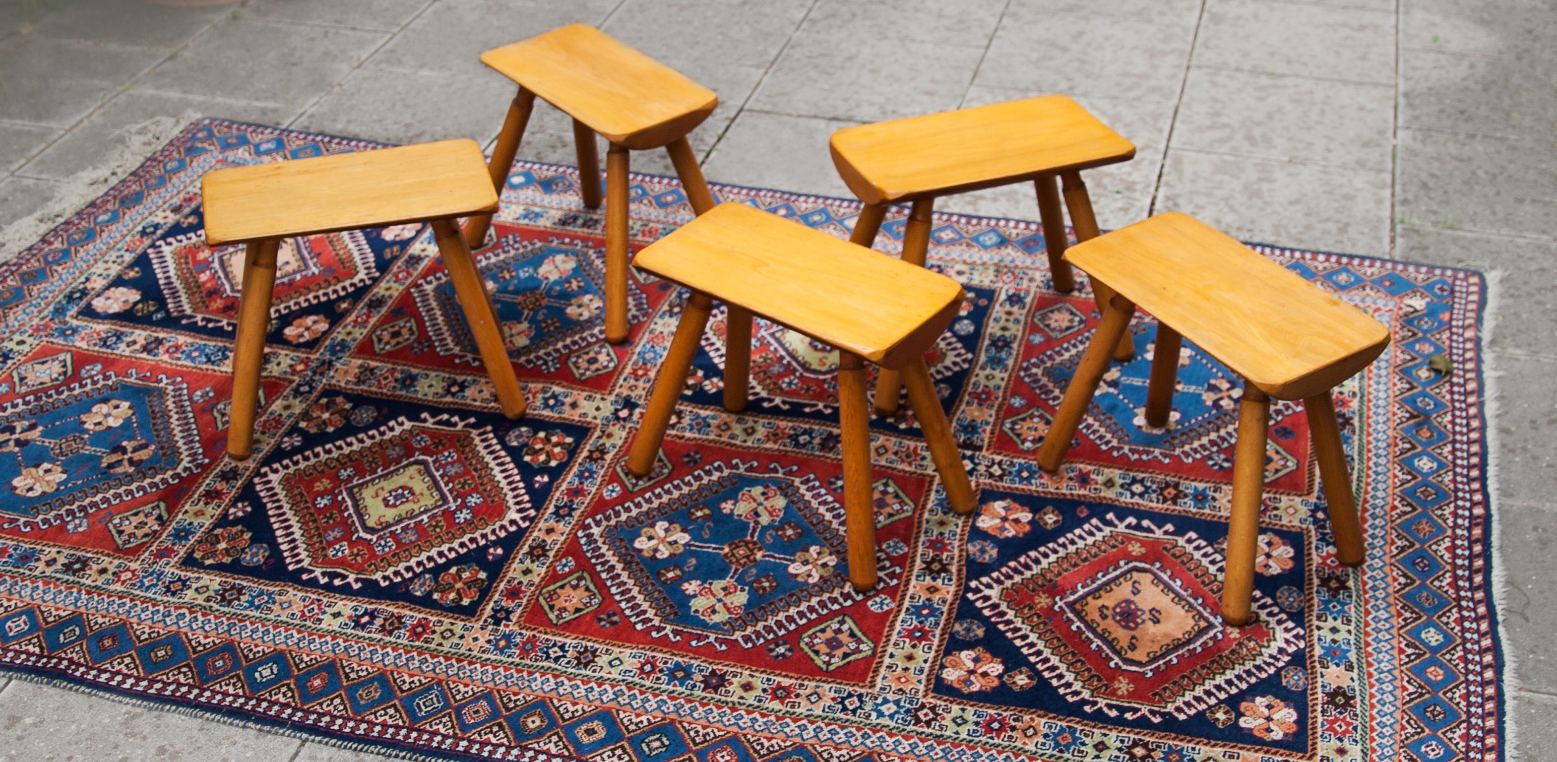 Set of five solid birch wood stools in the style of Charlotte Perriand made in France, 1950s.