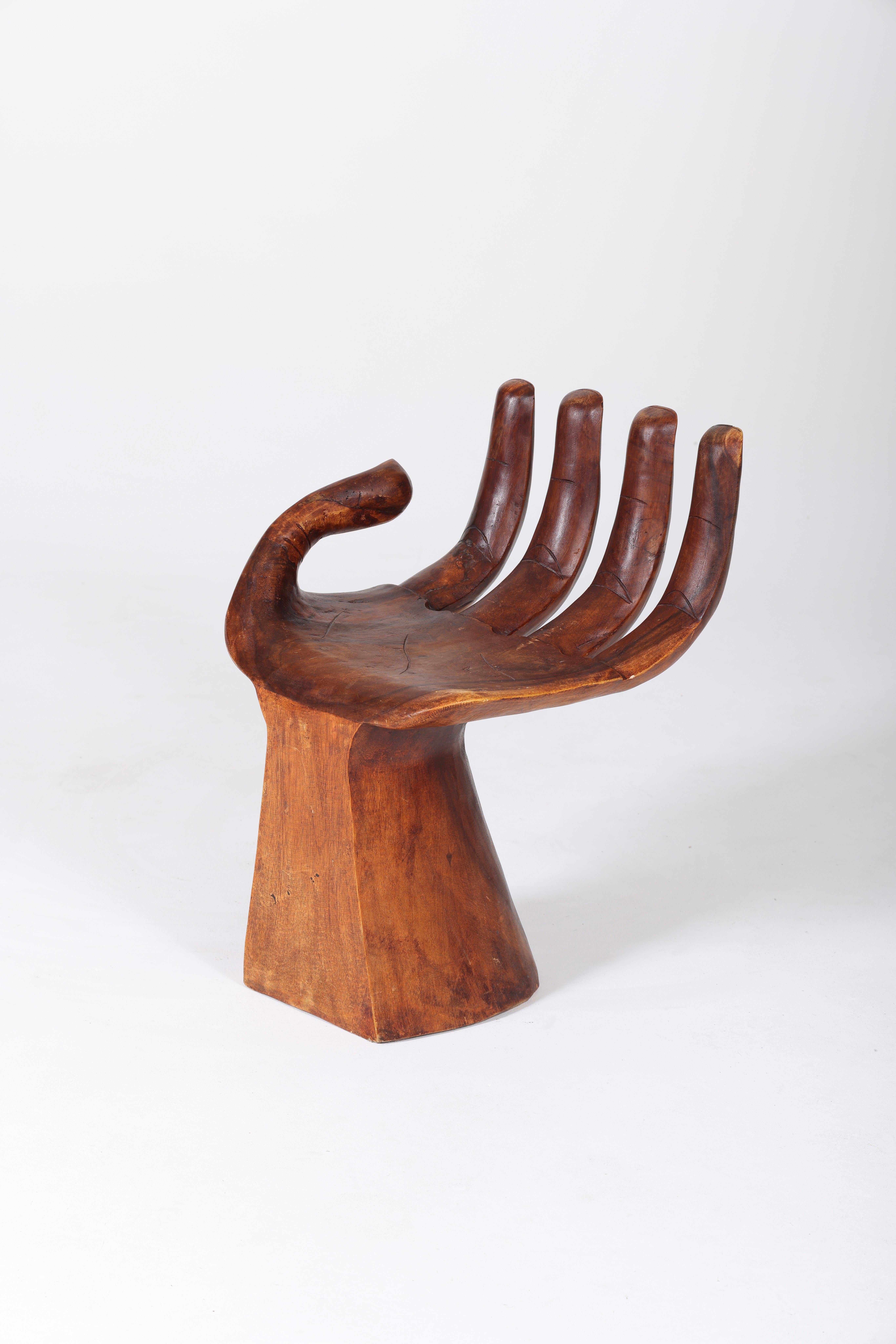 carved wooden hand chair