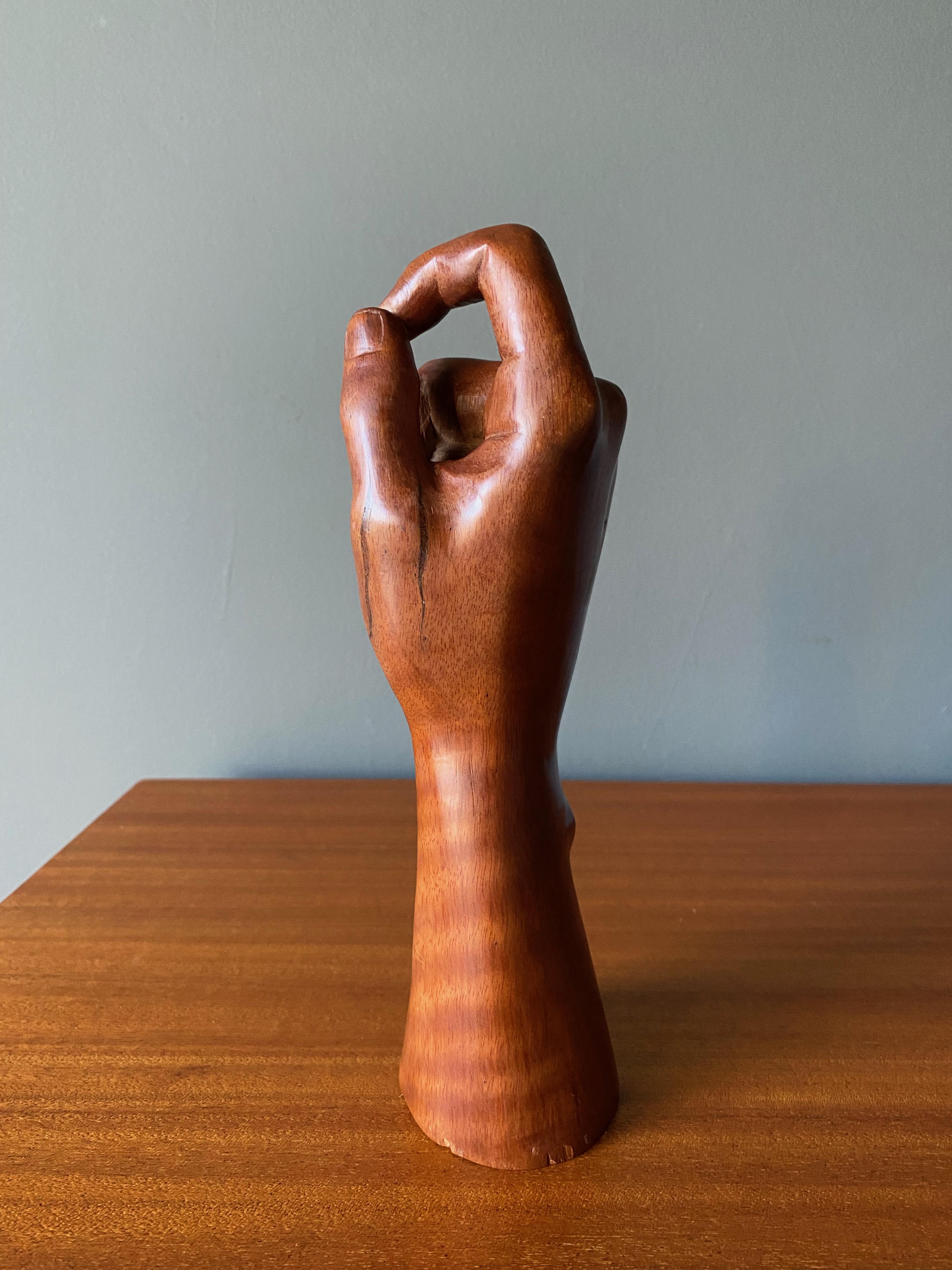 Solid wood hand sculpture-cigar holder, Cuba circa 1990s.