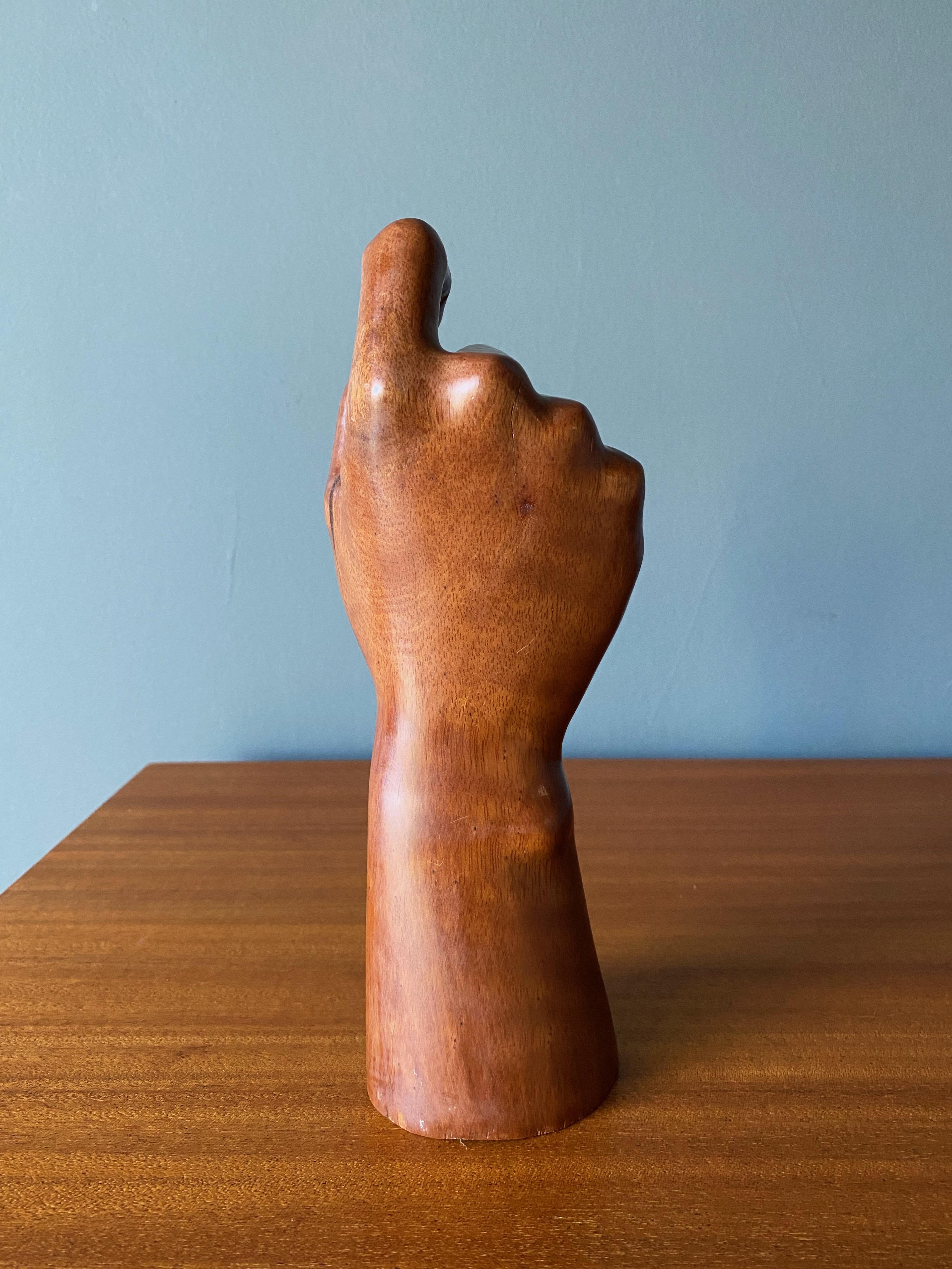 wooden hands sculpture