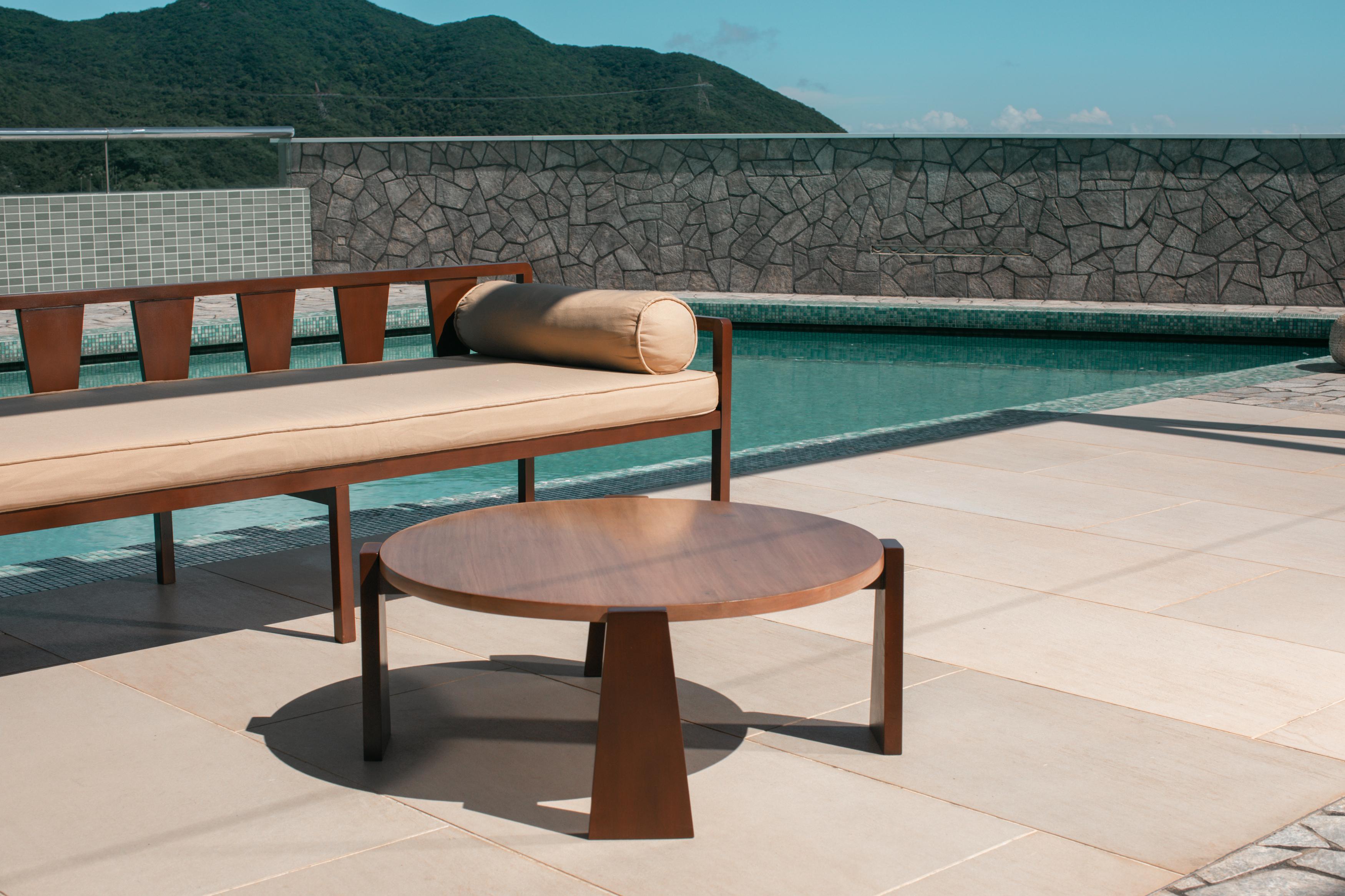 Featuring two tones of locally sourced solid wood, our coffee table C-Table-04 contrasts and highlights the beauty of natural wood with a unique outdoor design perfect for serving drinks or food when entertaining outdoors.  The wood features a