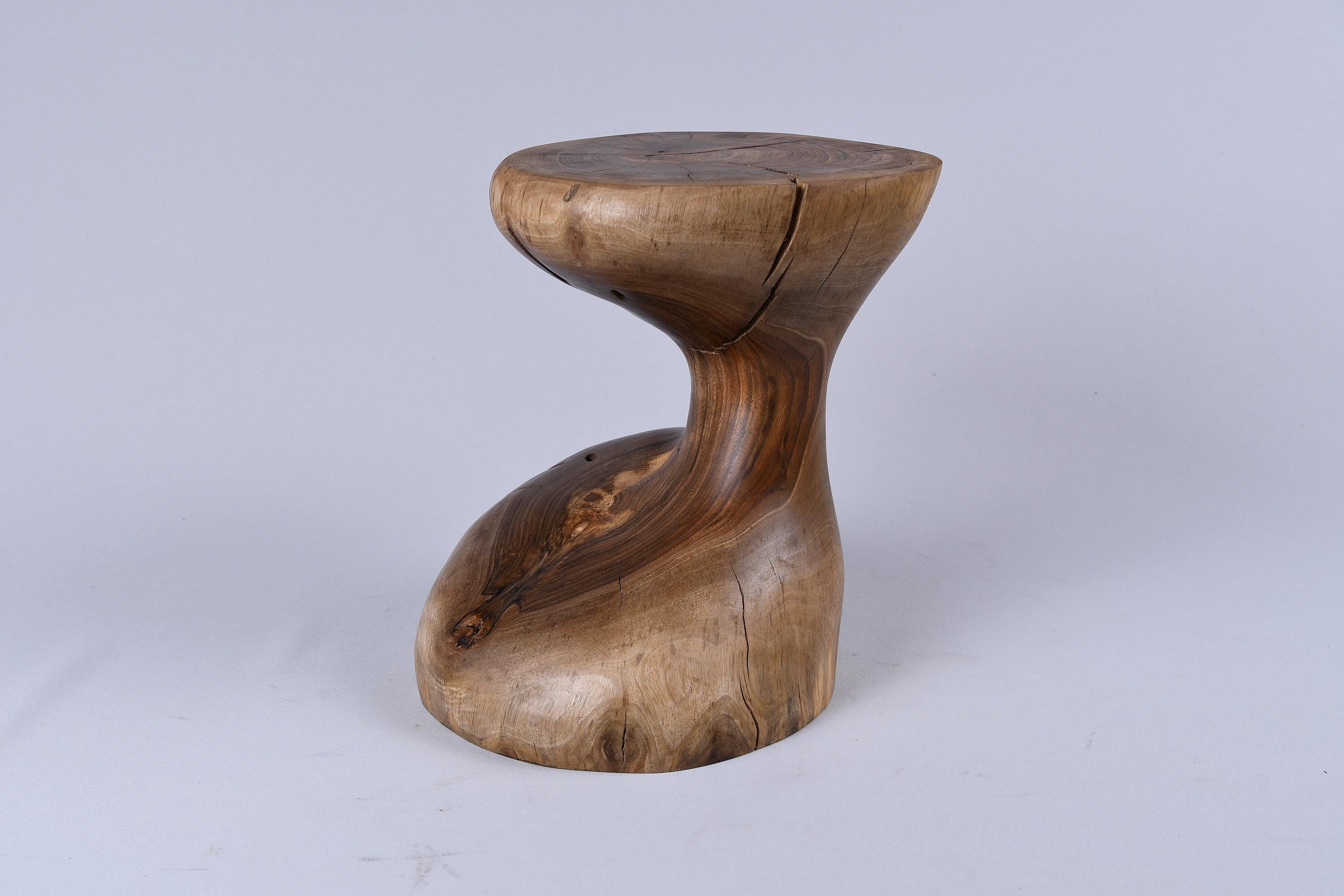 Unique chainsaw carved wooden functional sculpture usable as a multifunctional piece such as a stool, side table, pedestal, night table or many more. Carved from a single piece of wood and protected with the highest quality oils, ensuring durability