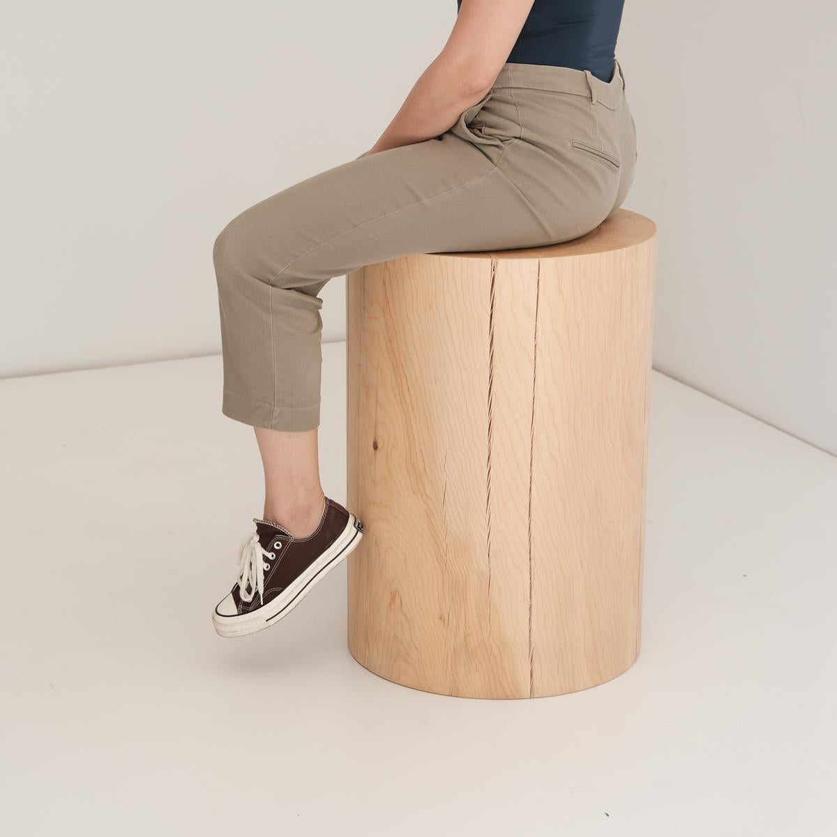 The Minimal Handcrafted Solid Cedar Platform/Stool is a refined piece that blends the raw beauty of nature with a modern design approach. Crafted from durable and richly textured cedar wood, it comes to life through detailed handcrafting, offering a
