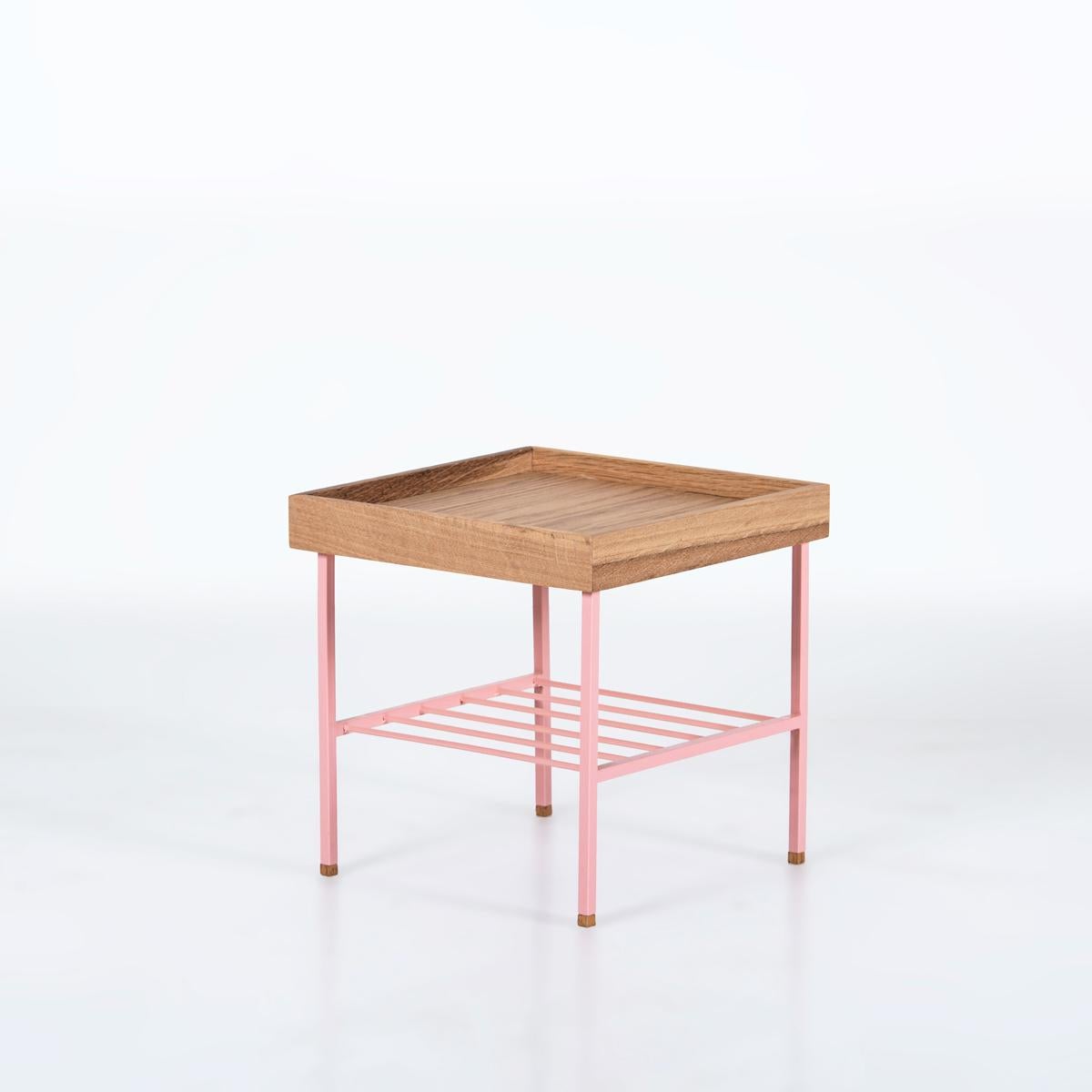 The EDGE Series solid wood short side table / plant stand is a compact and elegant piece designed for modern living. Handcrafted from 100% solid oak, it showcases the natural grain, texture, and warm tone of the wood, making each piece truly