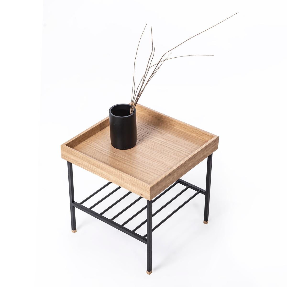 The EDGE Series solid wood short side table / plant stand is a compact and elegant piece designed for modern living. Handcrafted from 100% solid oak, it showcases the natural grain, texture, and warm tone of the wood, making each piece truly