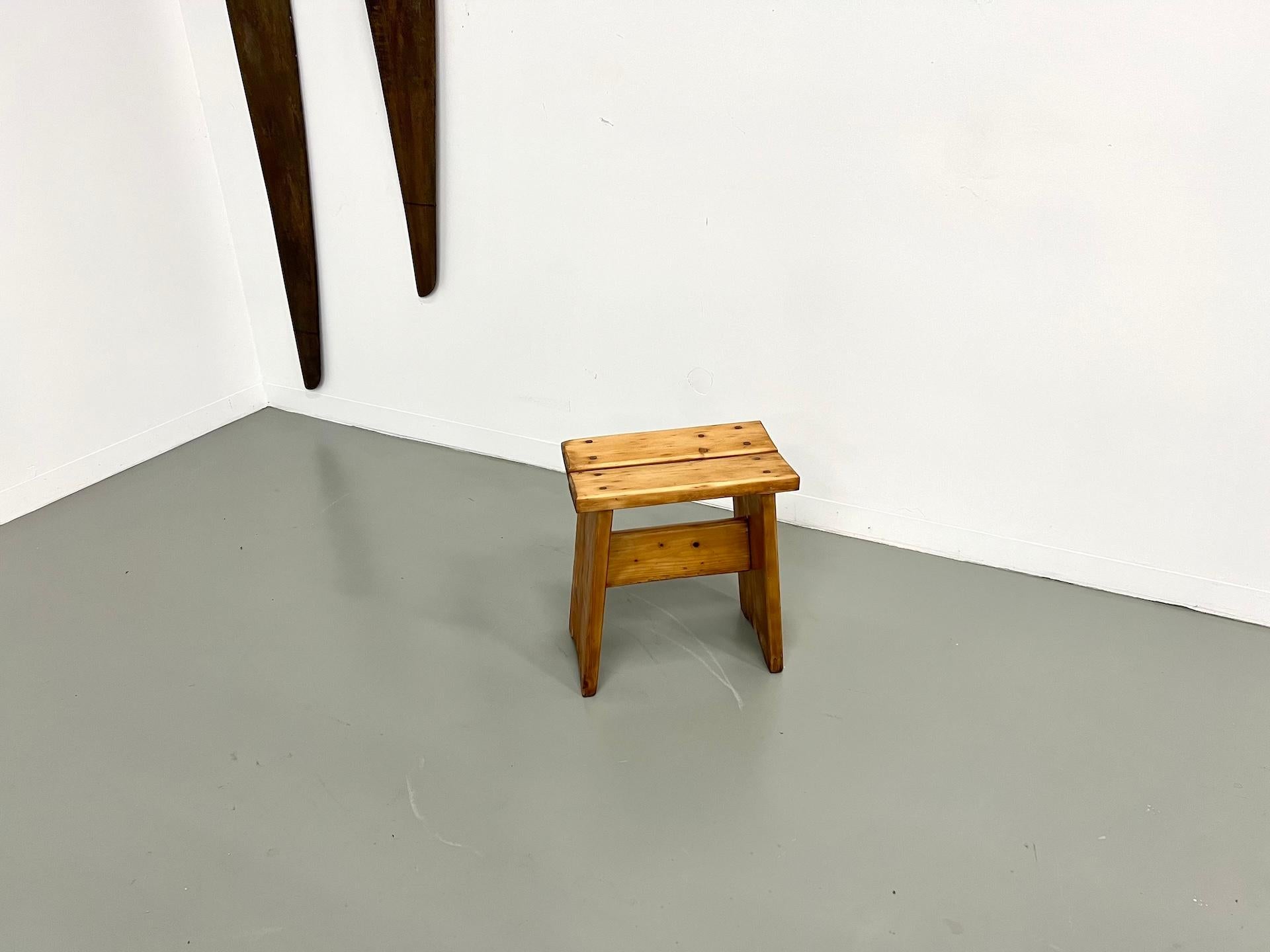 Mid-Century Modern Solid wood stool, crafted in the 1950s-70s, in the style of Charlotte Perriand. For Sale