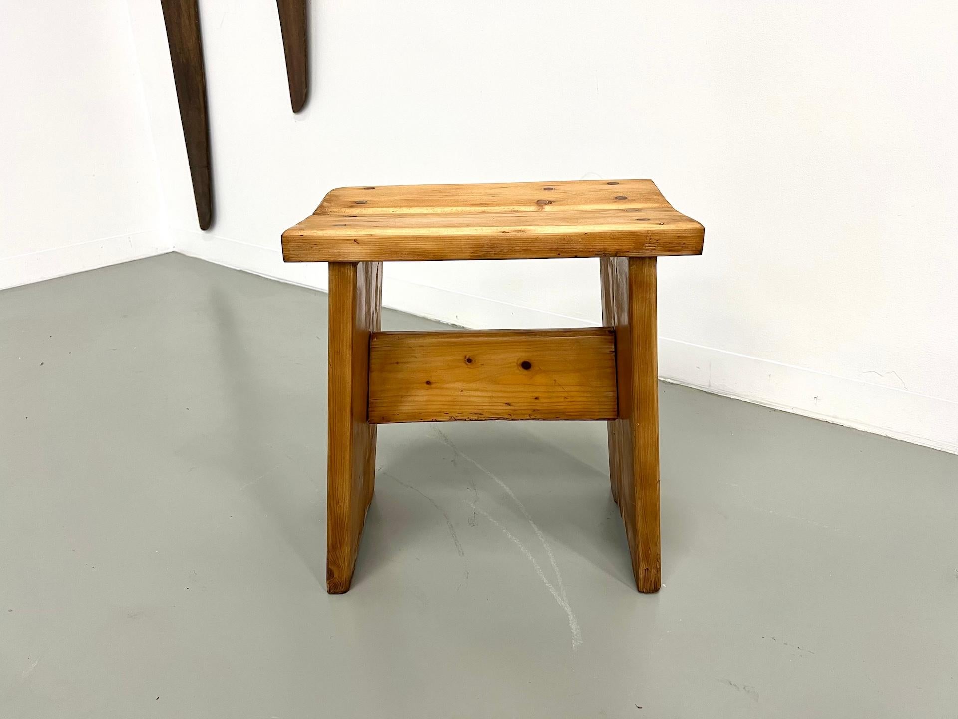 French Solid wood stool, crafted in the 1950s-70s, in the style of Charlotte Perriand. For Sale