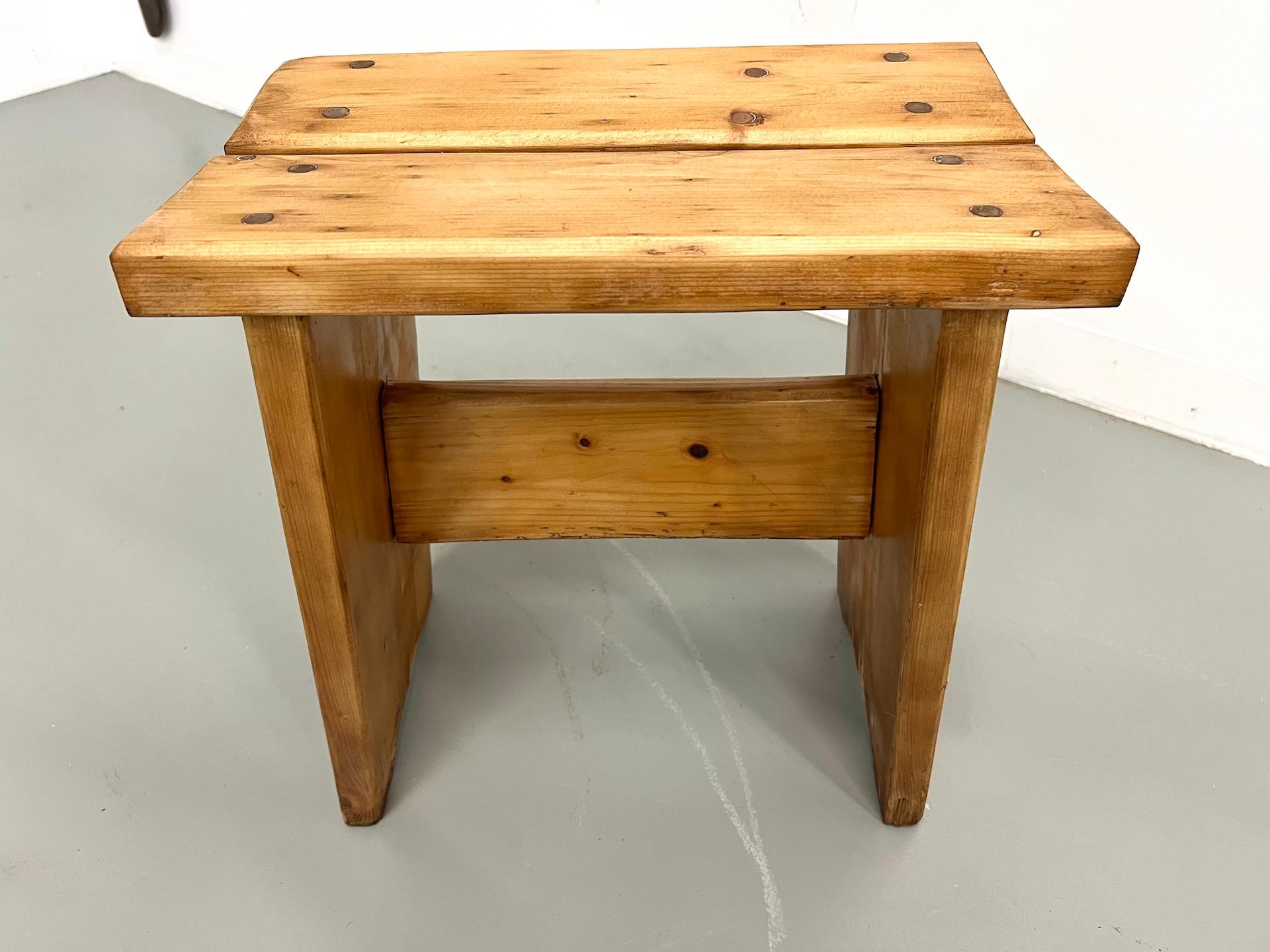 Mid-20th Century Solid wood stool, crafted in the 1950s-70s, in the style of Charlotte Perriand. For Sale
