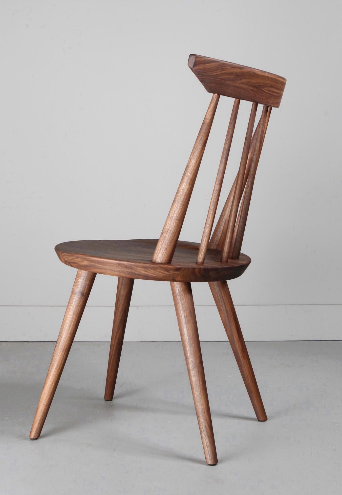The Vände chair is a contemporary take on the classic Windsor chair. Hand-turned spindles feature wedged, mortice and tenon joinery for strength and aesthetic appeal.

The round seat has been sculpted for comfort. The back rest is both supportive