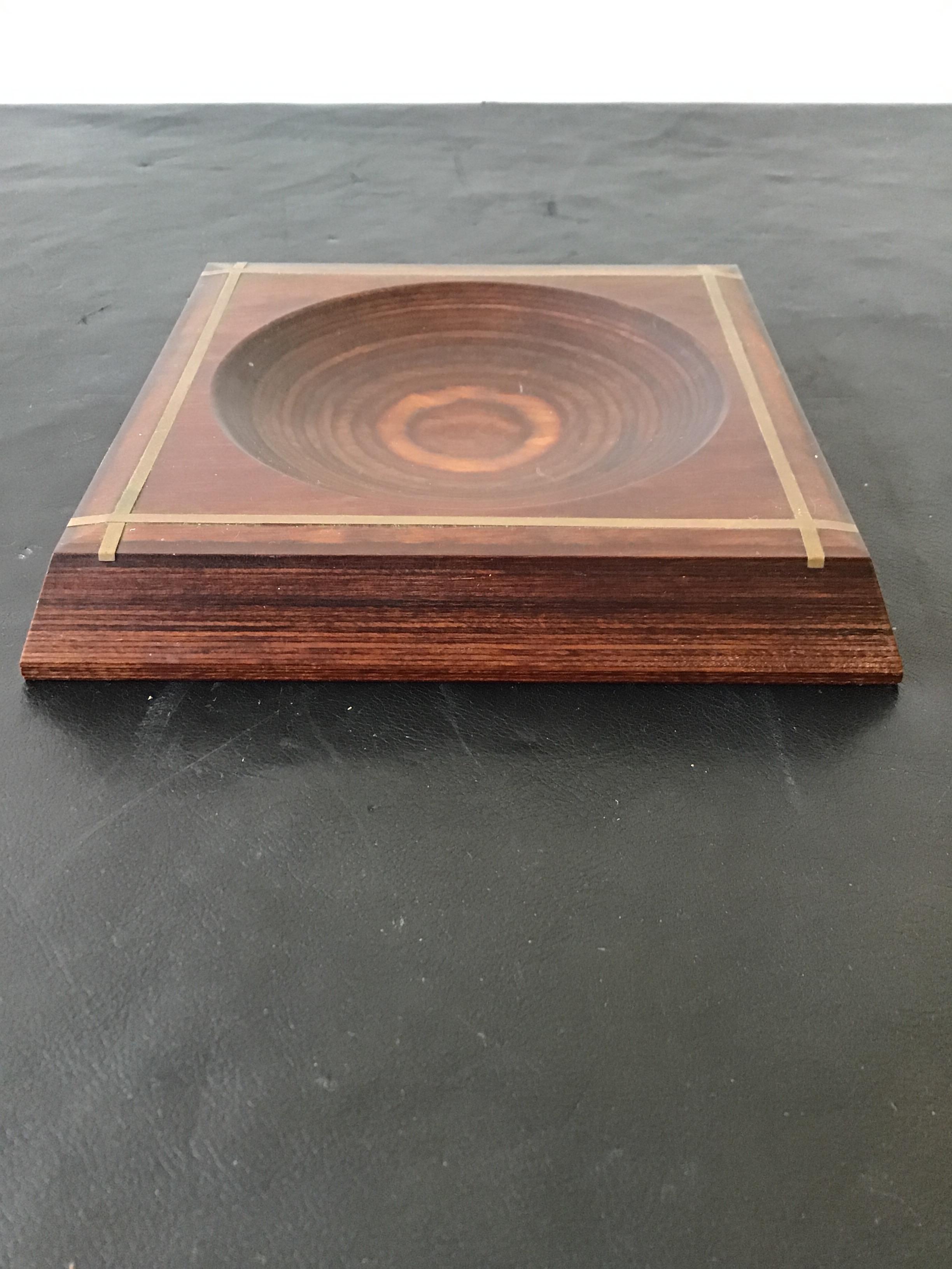 Solid wood with brass inlay coin dish.