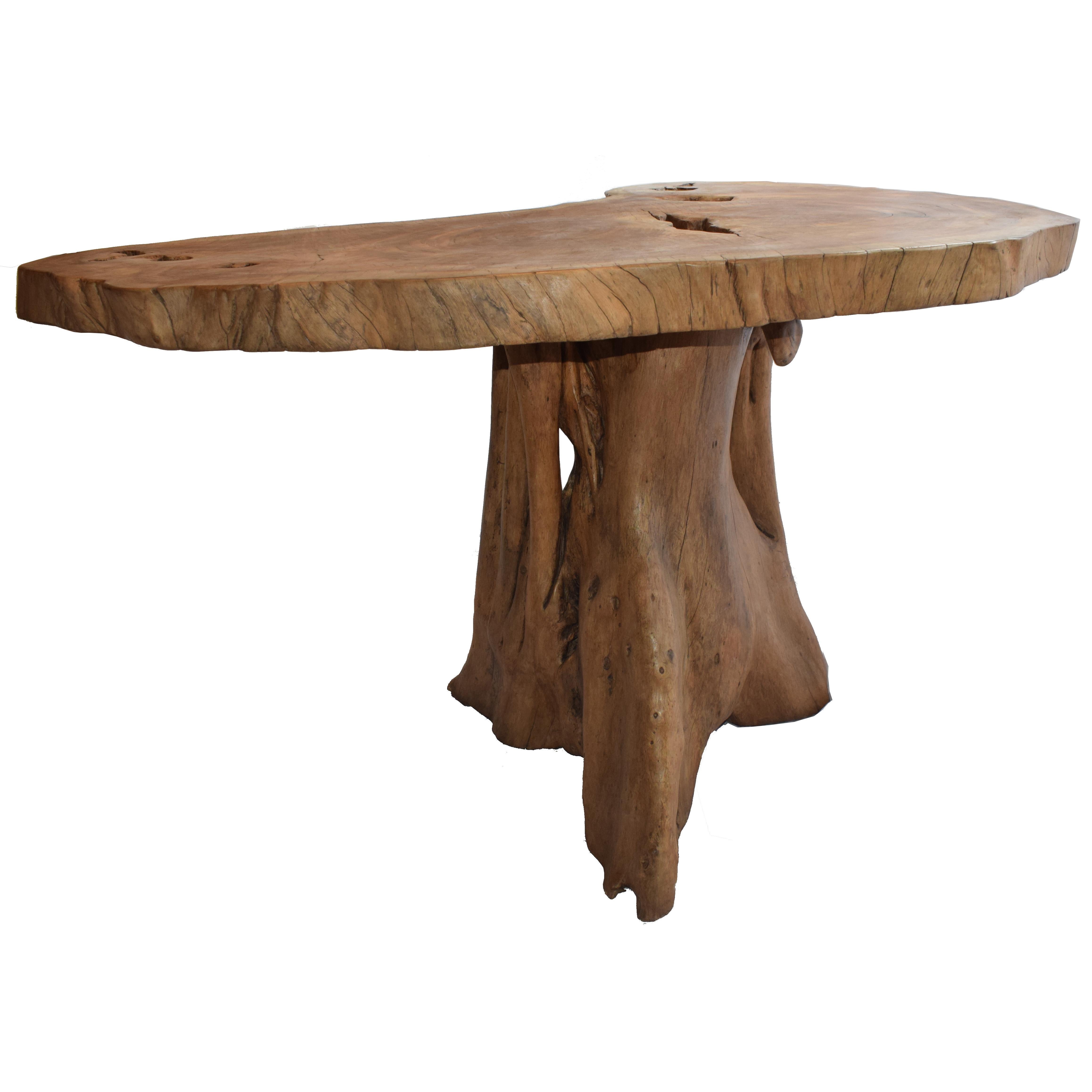 Portrait of Africa Table
 
The `Portrait of Africa` table has the shape of the continent of Africa.
Actually Mr. Erasmus, the artist who made this masterpiece found a log in the bush. He recognized the form of Africa in this log and cut of a slice