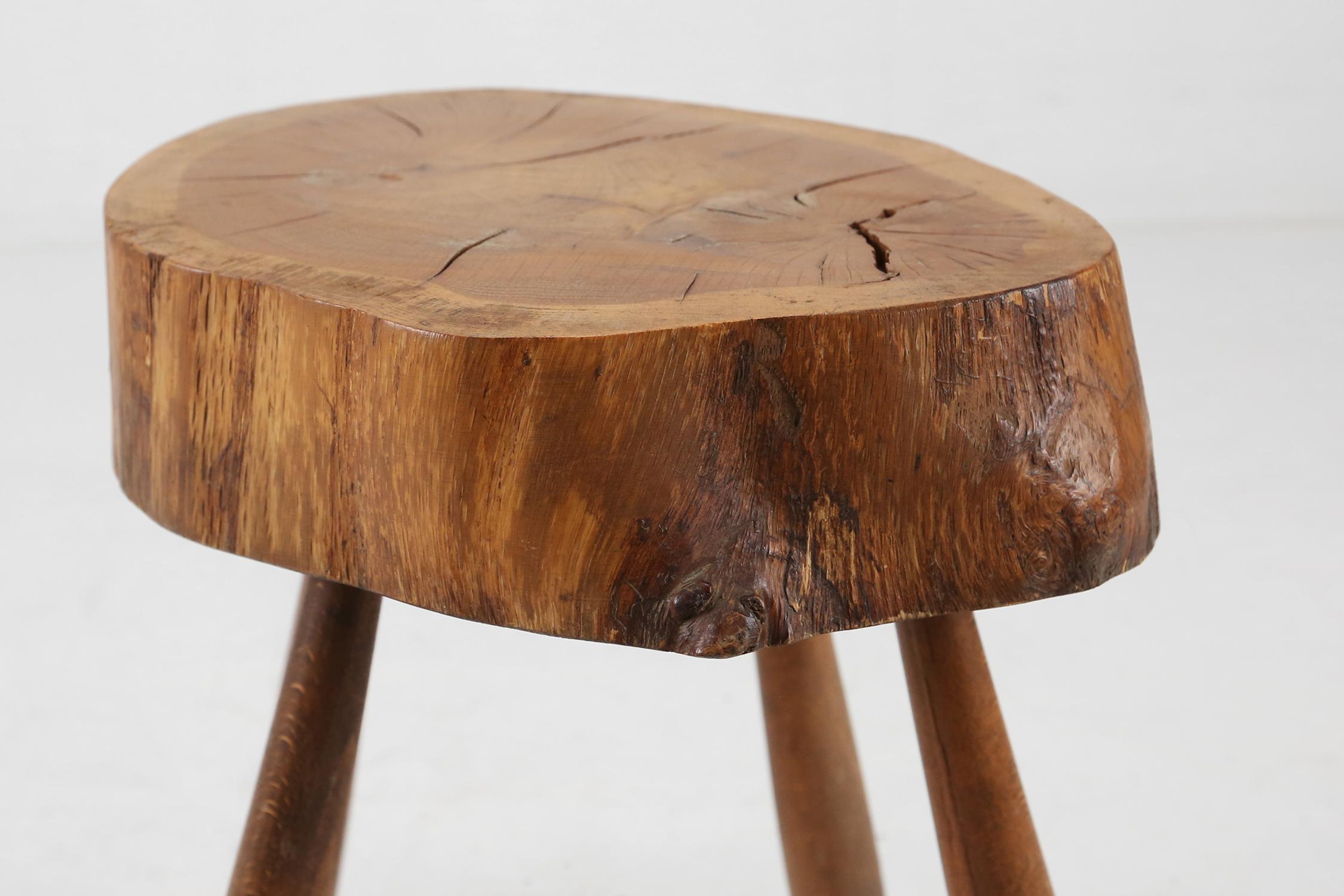 French rustic solid wooden stool made around 1920.