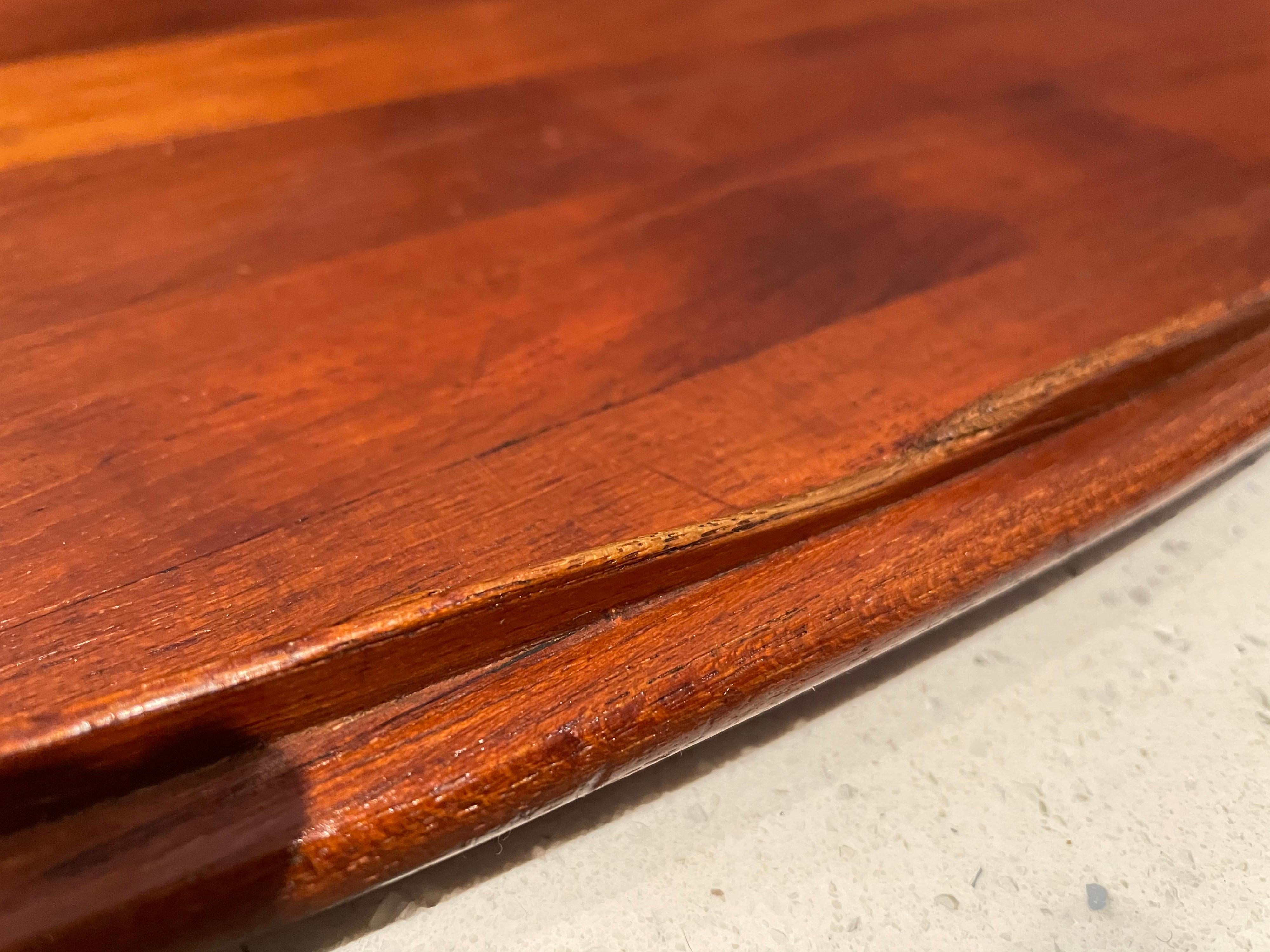 Beautiful solid extra large teak gondola tray designed by Jens Quistgaard for Dansk; early production. Original condition with raised edges and elegant lines. The large tray is 26.75