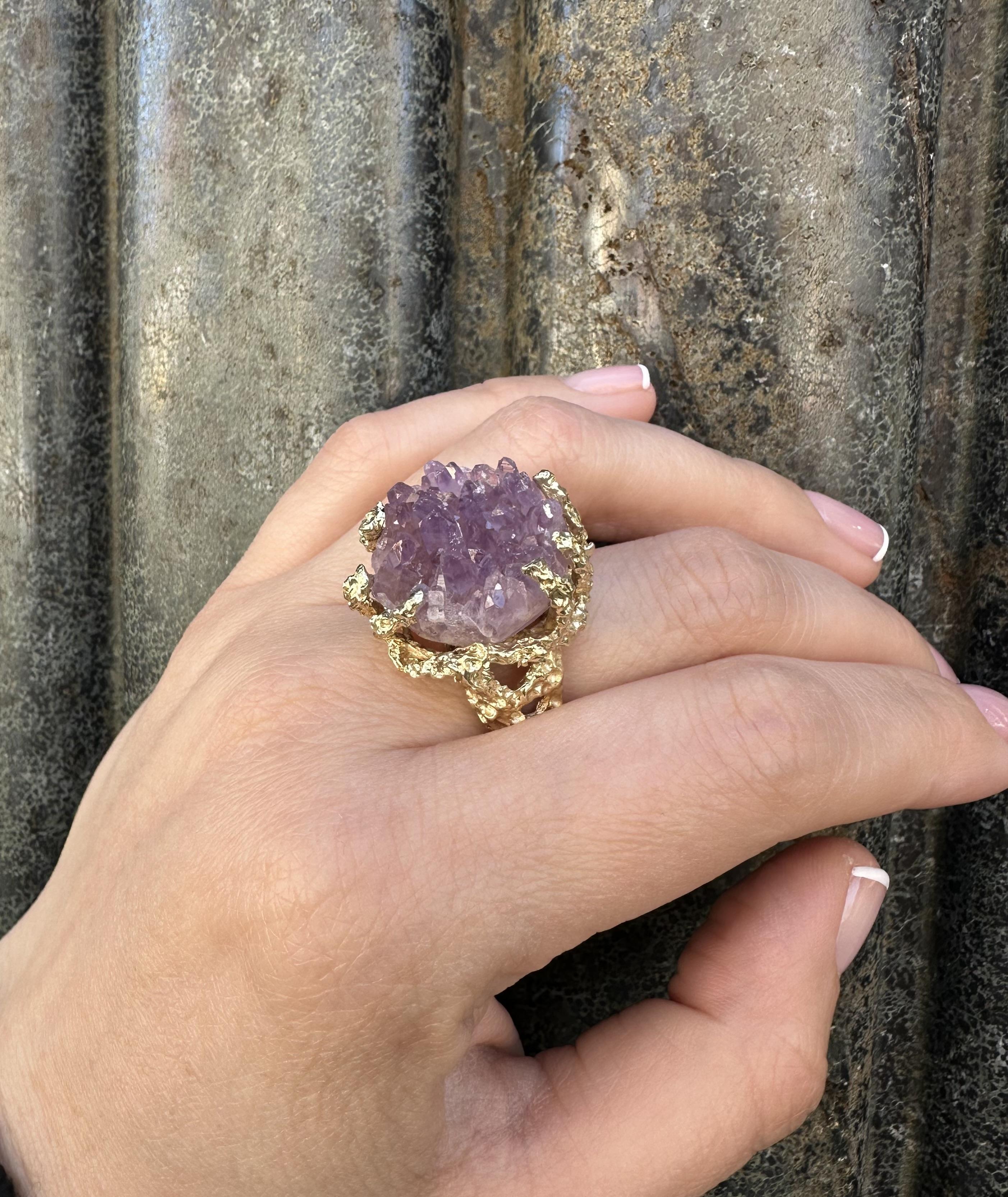 --Stone(s):--
(1) Natural Genuine Amethyst Crystal - Raw Uncut - Prong Set - Purple Color - 18.9x20.5mm (approx.)

Material: Solid 14K Yellow Gold 
Weight: 20.26 Grams
Ring Size: 6.5 (Fitted on a finger. We can custom size this ring. - Please let us