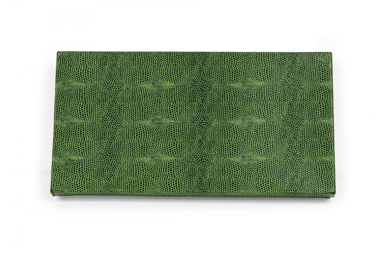 3-Piece German Rustic stainless steel and horn carving utensil set comprised of a carving knife, carving fork, and shears, in a green satin-lined box. (stampled, OTHELLO SOLINGEN ROSTFREI)(PRICED AS SET)(Similar piece: 063344)