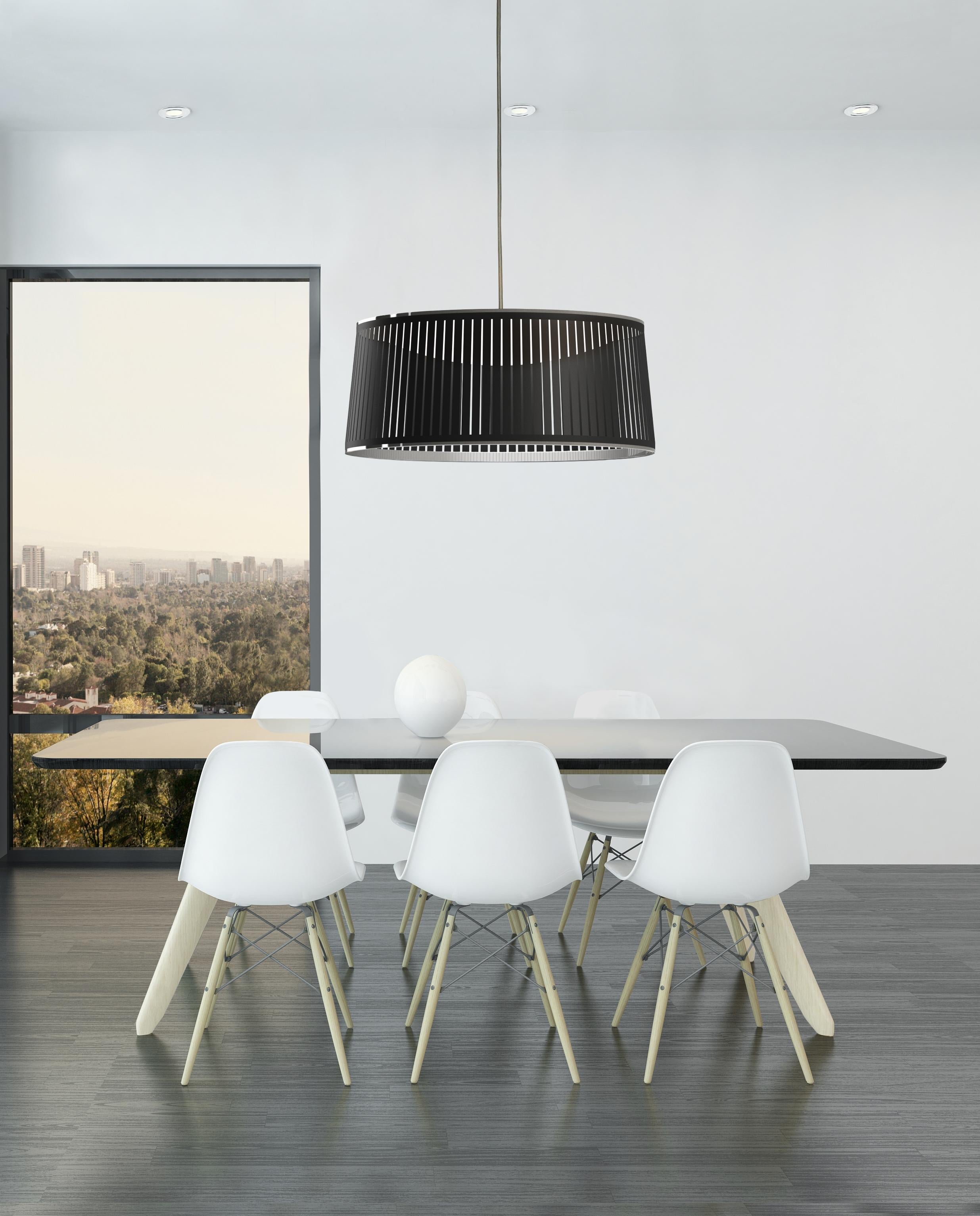The new Solis Drum pendant is the latest addition to the elegant Solis suspension family. Featuring a uniquely engaging blend of light and shadow, Solis Drum is made of laser cut polyester fabric combined with an aluminum top and bottom ring