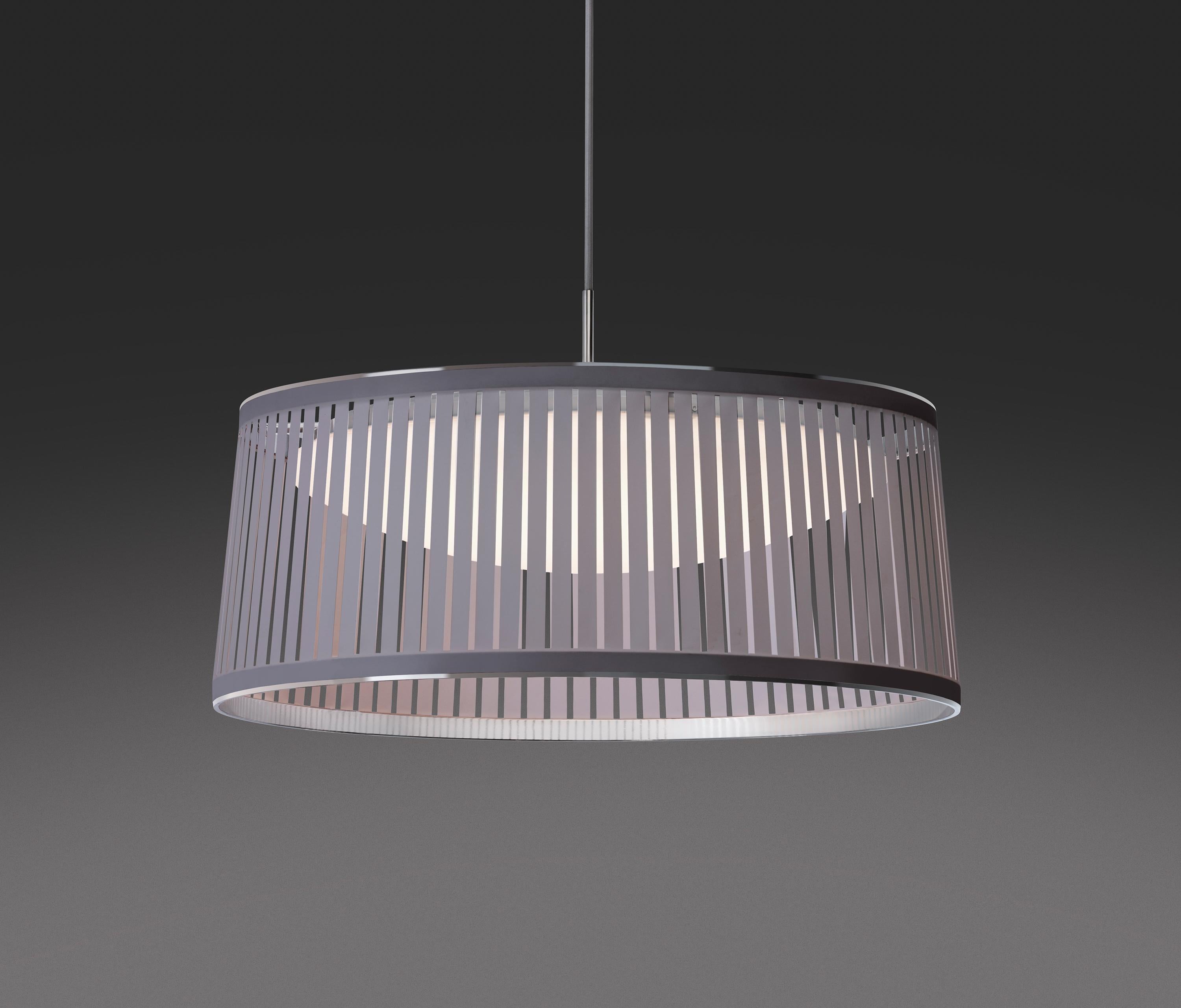 The new Solis Drum pendant is the latest addition to the elegant Solis suspension family. Featuring a uniquely engaging blend of light and shadow, Solis Drum is made of laser cut polyester fabric combined with an aluminum top and bottom ring