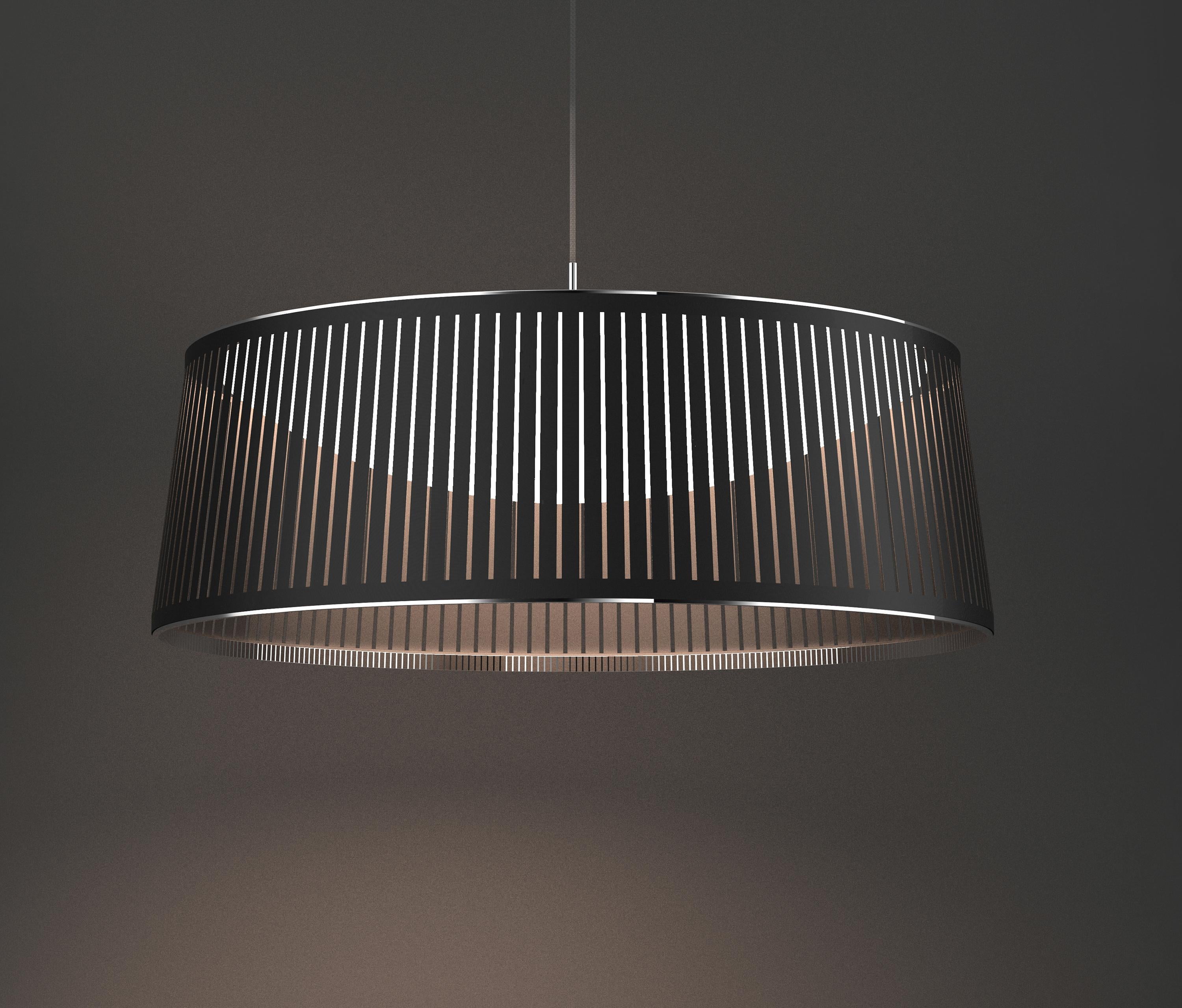 The new Solis Drum pendant is the latest addition to the elegant Solis suspension family. Featuring a uniquely engaging blend of light and shadow, Solis Drum is made of laser cut polyester fabric combined with an aluminum top and bottom ring