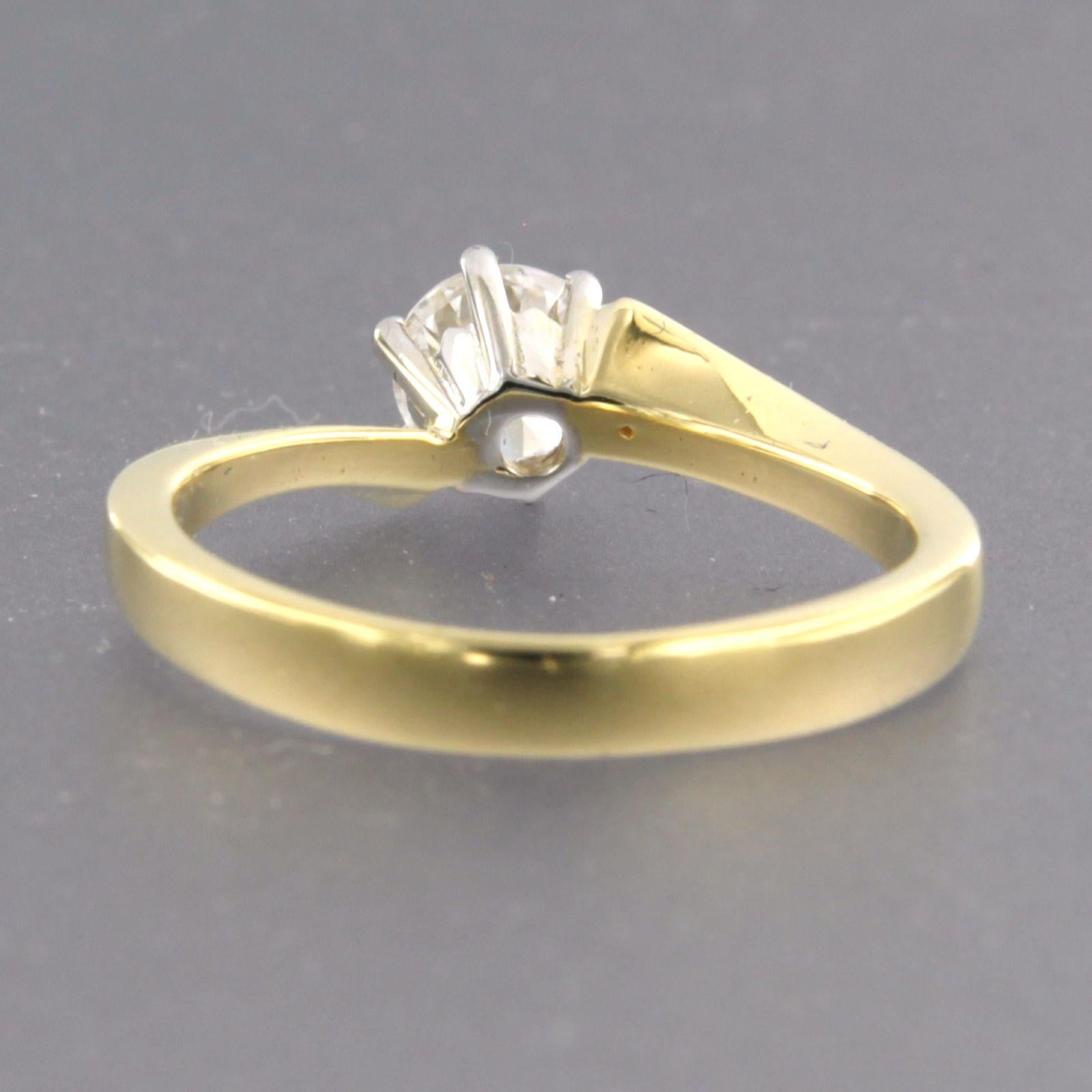 Brilliant Cut Solitair ring set with diamonds 0.50ct 18k bicolour gold For Sale