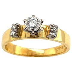 Solitaire 0.20ct Diamond Ring in 18ct Yellow Gold 
Platinum