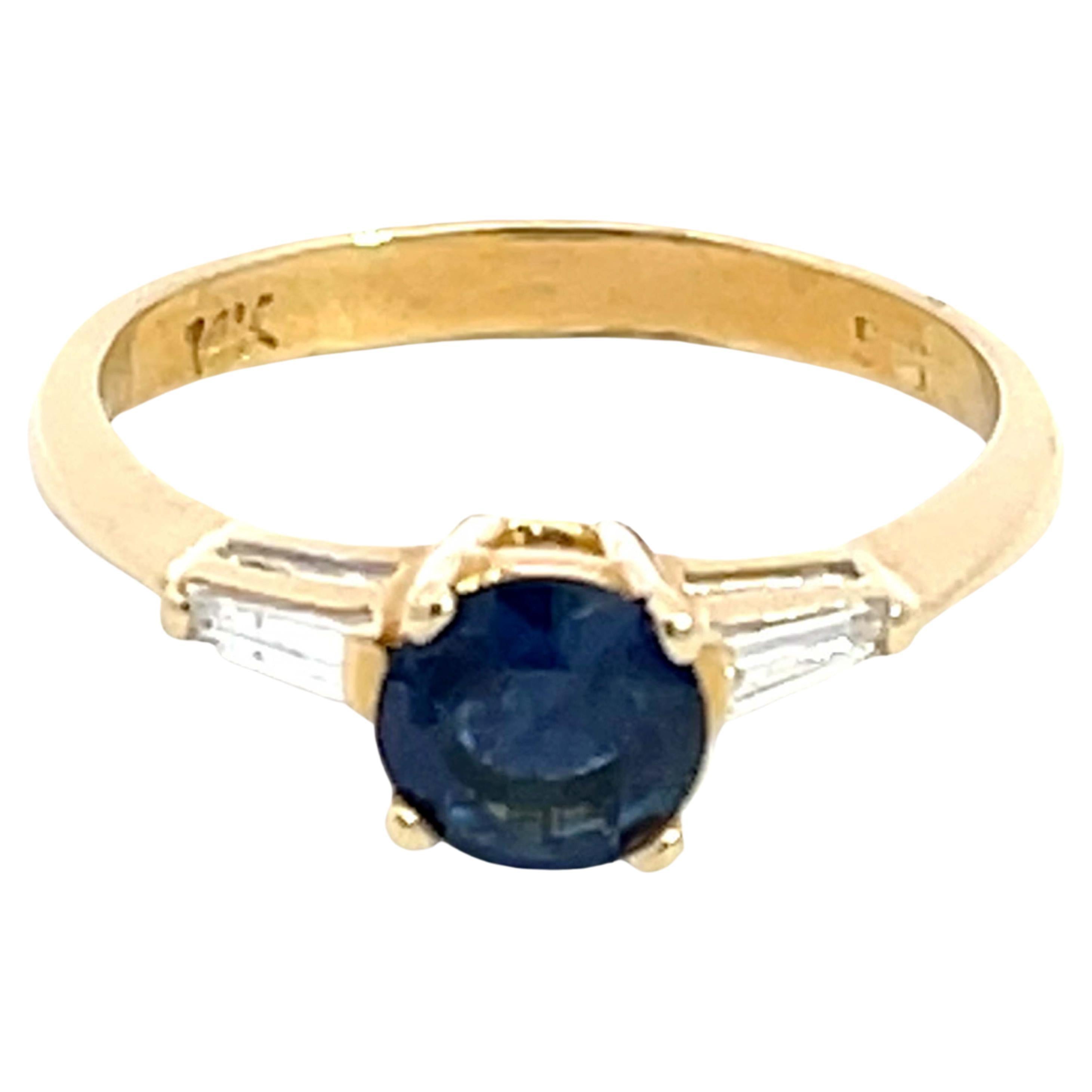 Solitaire Blue Sapphire with Baguette Diamond Accents Ring in 14k Yellow Gold For Sale