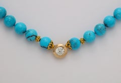 Solitaire Diamond and Sleeping Beauty Turquoise Necklace With a 14k Gold Clasp