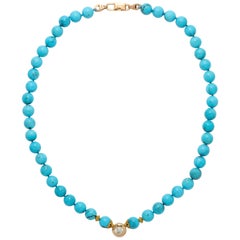 Solitaire Diamond and Sleeping Beauty Turquoise Necklace With a 14k Gold Clasp