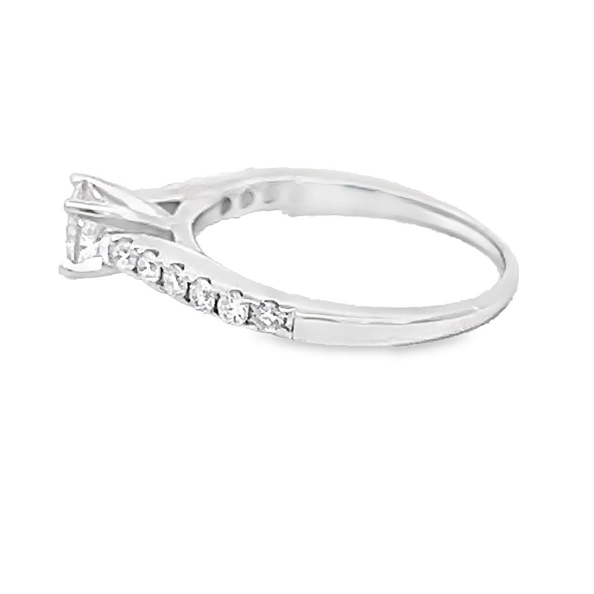 Solitaire Diamond Engagement Ring
Natural Full Brilliant Cut Diamonds 
14k White Gold
4 prongs setting
Number of Diamonds: 13
Total Diamonds Weight: 0.82 CT (including center stone)
Diamond Center Stone: 0.57 CT
Diamond’s Color: G/H
Diamond’s