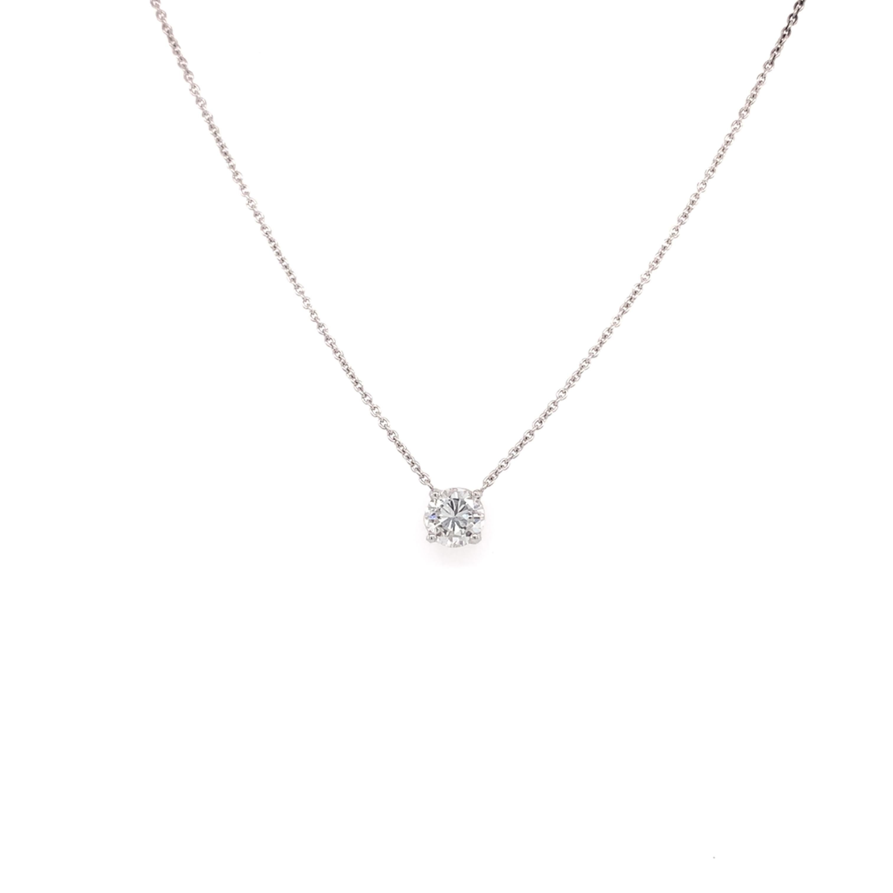 Solitaire Diamond Pendant made with real/natural brilliant cut diamonds. Total Diamond Weight: 0.47 carats. Diamond Quantity: 1 brilliant cut diamond. Diamond Color: G-H Diamond Clarity: SI2 Mounted on 18kt white gold, adjustable chain necklace. 
