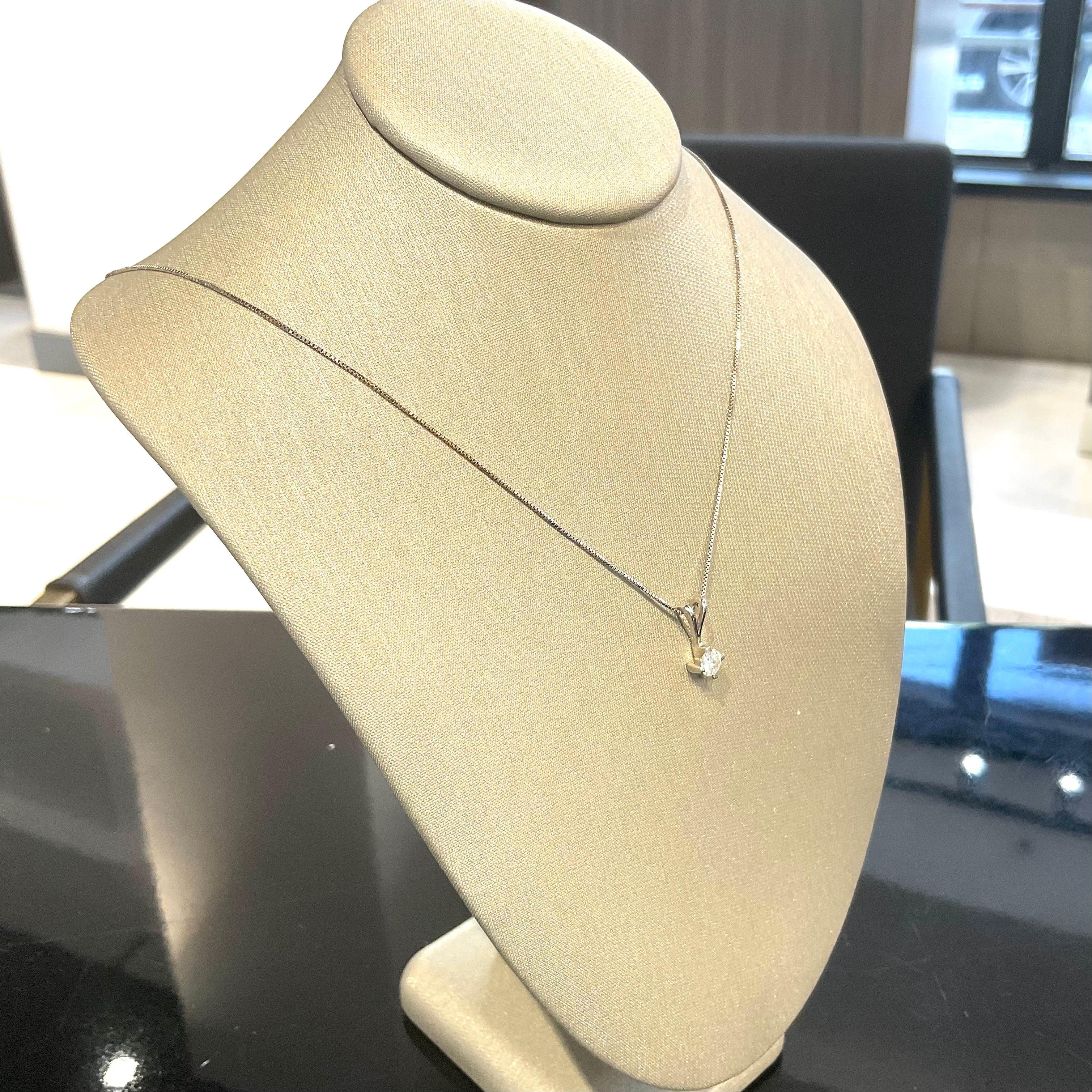 Style: Solitaire Diamond Pendant Necklace
Metal: White  Gold 
Metal Purity: 14K
Stones: Diamonds​​​​​​​
Diamond Clarity: VSI
Diamond Color: G
Total Carat Weight: 0.25 ct 
Necklace Length: 15 in 
Total Weight: 1.6 g
Includes: 24 Month Brilliance