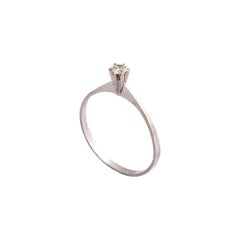 Anillo de diamante solitario