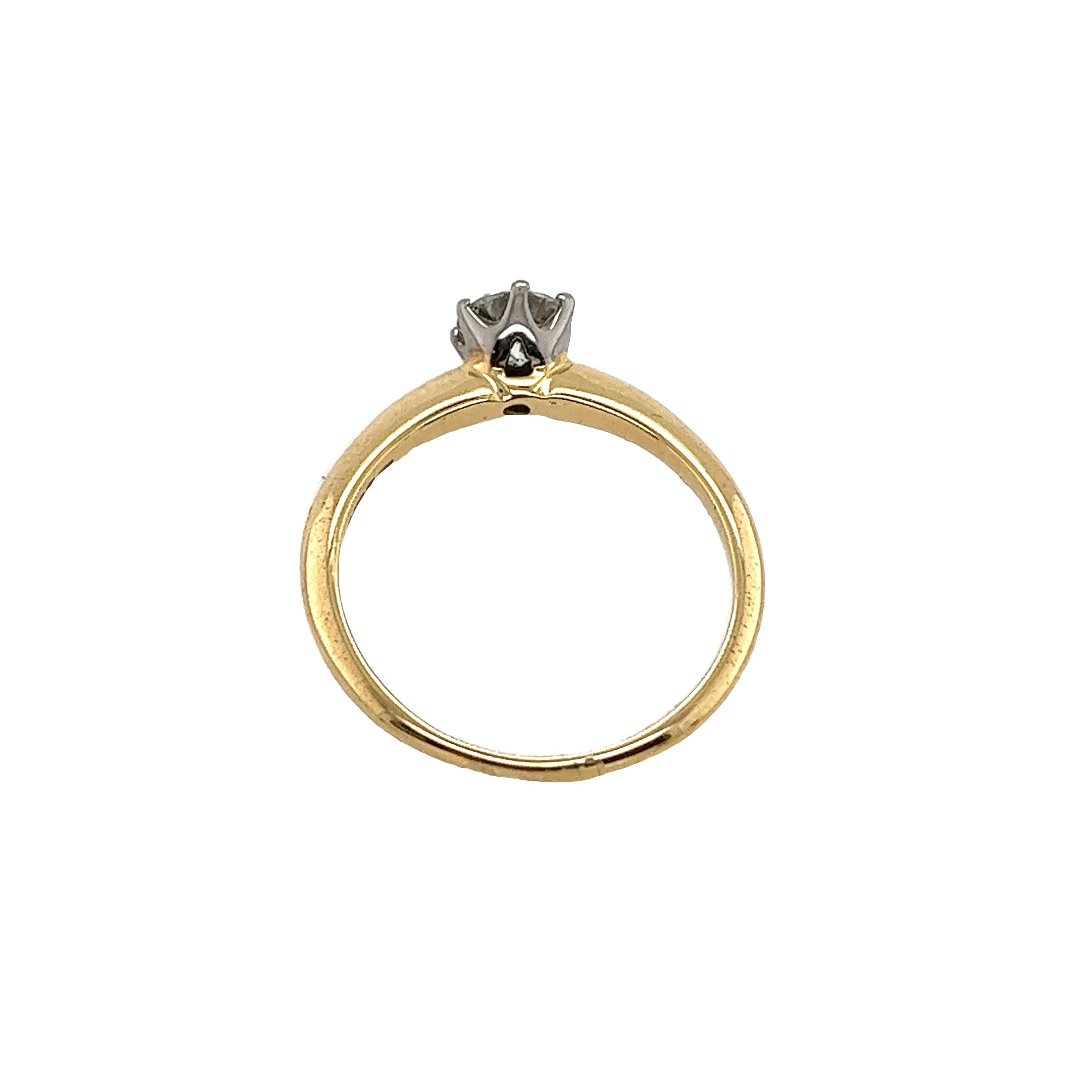 A beautiful 18ct Yellow & White Gold solitaire Diamond ring, set with a 0.50ct Round brilliant cut Diamond. This engagement ring is a perfect symbol of your commitment to love.

Additional Information: 
Total Diamond Weight: 0.50ct
Diamond Colour: