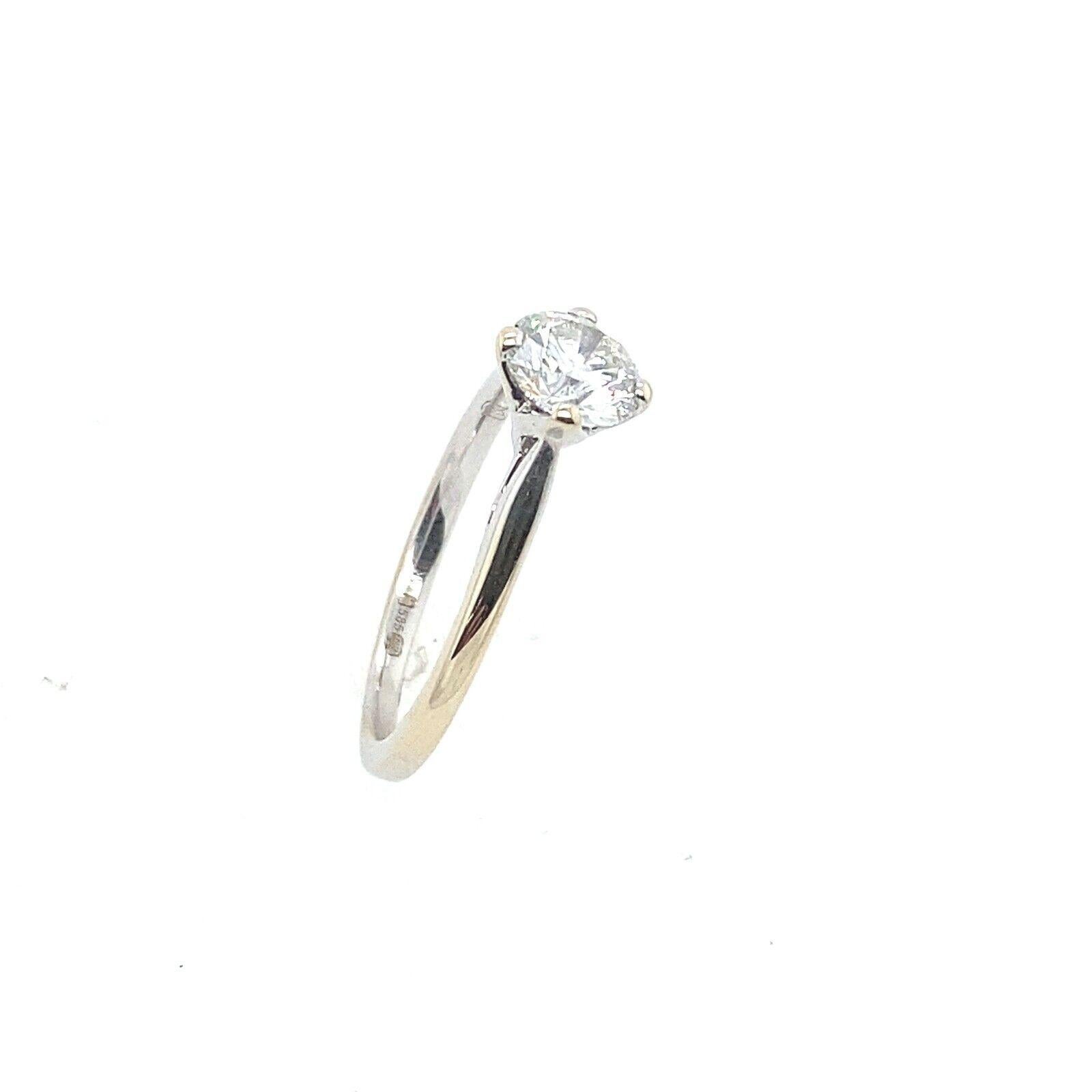 The 14ct White Gold band is set with a 0.84ct I/SI2 Round Brilliant Cut natural Diamond in a classic 4-claw setting and finished with high polished edges. This ring is elegant and beautiful. GIA certificate.

Additional Information:
Total Diamond