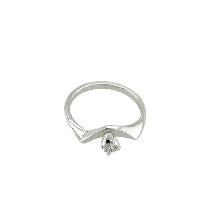 18ct White Gold Solitaire Diamond Ring In Unusual Wishbone Shape

Additional Information:
Total Diamond Weight: 0.125ct
Diamond Colour: G/H
Diamond Clarity: VS2
Total Weight: 2.5g
Ring Size: M
SMS4019
