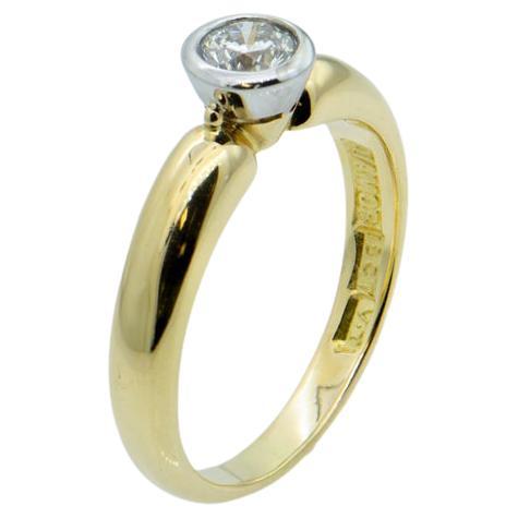 Solitaire Engagement Ring in Bezel Setting For Sale