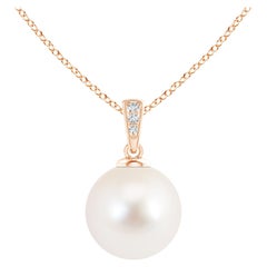 Ciondolo solitario con perla d'acqua dolce e diamanti in oro rosa 14K
