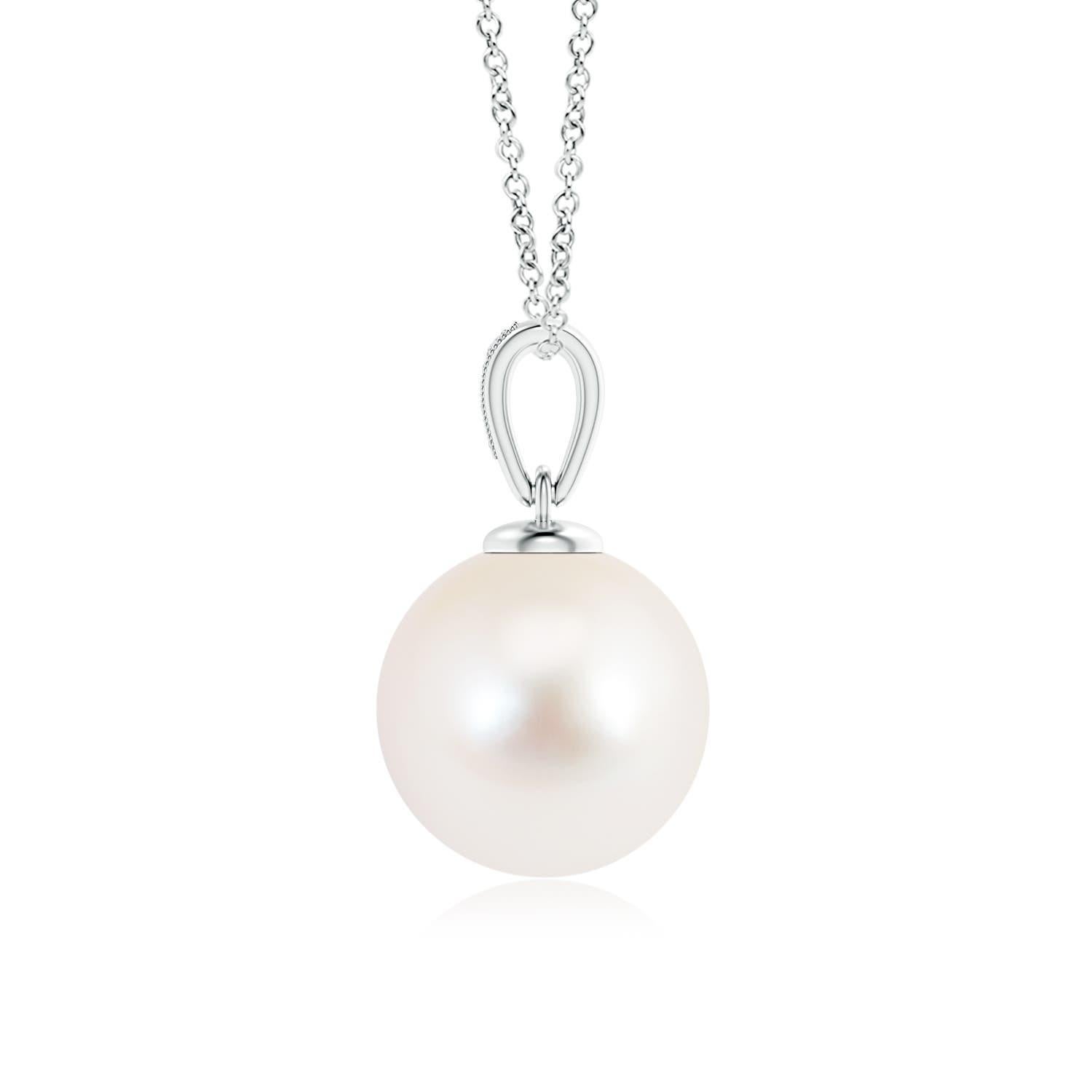 This 14K white gold solitaire pearl pendant offers a simple yet elegant look. The diamonds pavÃ© set on the bale offer a glittering effect to the lustrous pearl, while the milgrain detail on the bale lends a slight vintage touch. You can flaunt a