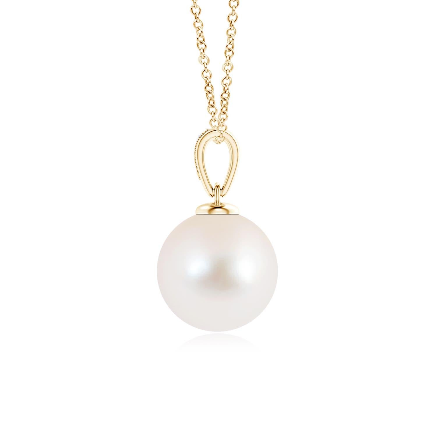 This 14K yellow gold solitaire pearl pendant offers a simple yet elegant look. The diamonds pavÃ© set on the bale offer a glittering effect to the lustrous pearl, while the milgrain detail on the bale lends a slight vintage touch. You can flaunt a