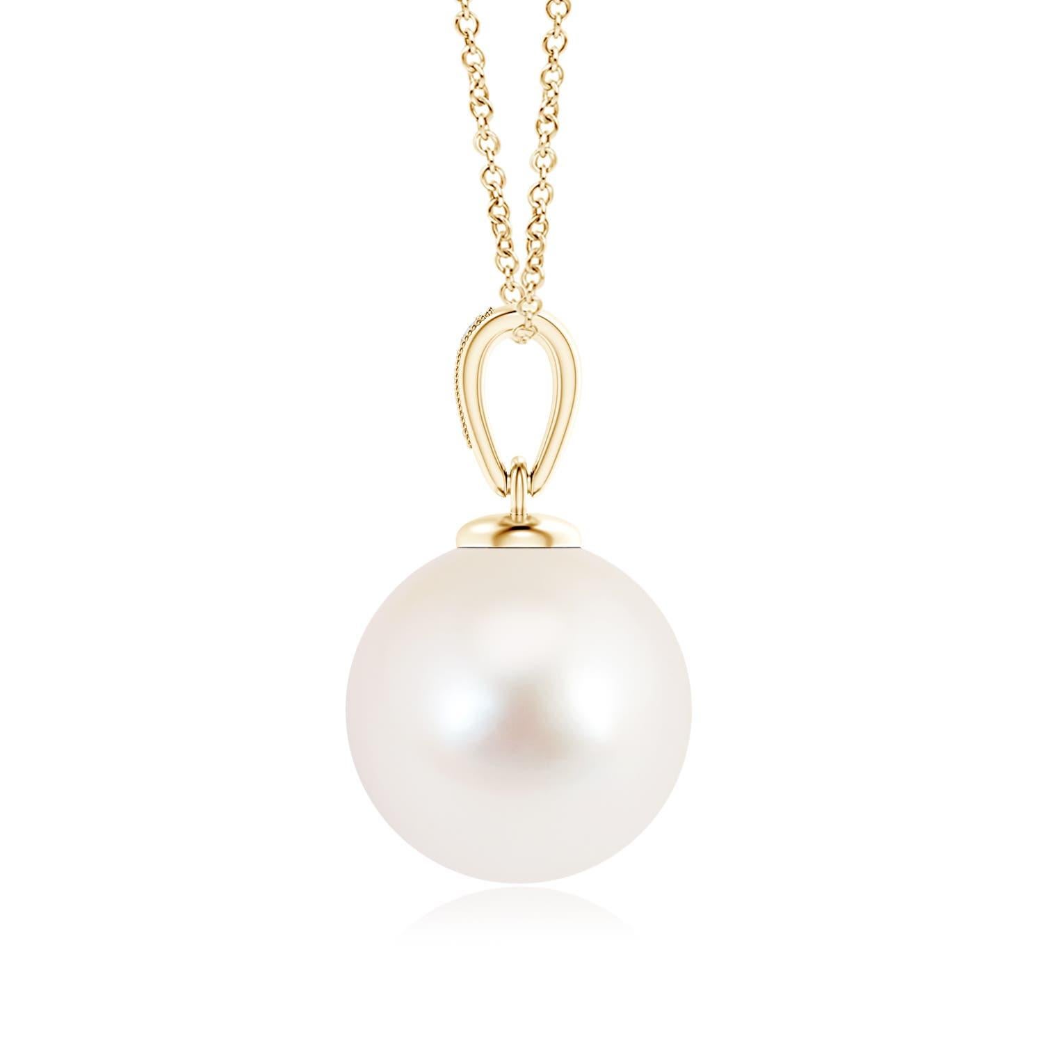 This 14K yellow gold solitaire pearl pendant offers a simple yet elegant look. The diamonds pavÃ© set on the bale offer a glittering effect to the lustrous pearl, while the milgrain detail on the bale lends a slight vintage touch. You can flaunt a