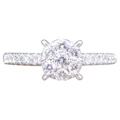 Solitaire Illusion set Diamond Cluster Ring in White Gold with Diamond Shoulders