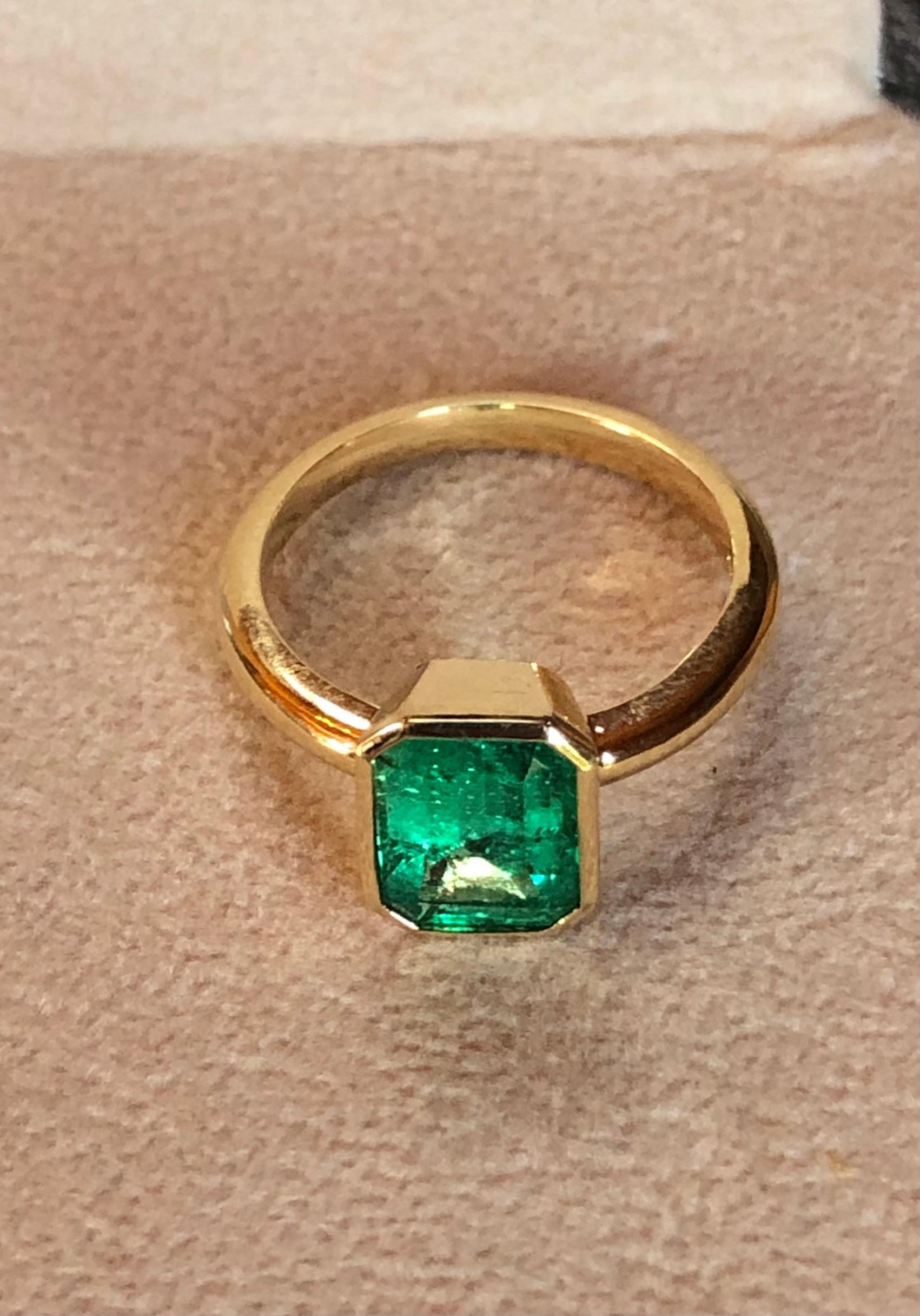 Emerald Cut Emeralds Maravellous Solitaire Natural Colombian Emerald 18K Engagement Ring For Sale